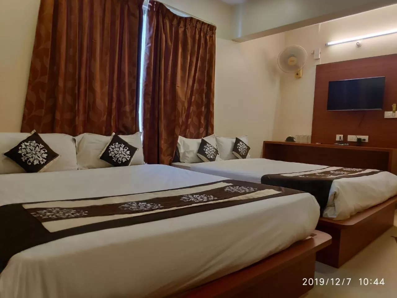 Photo of the whole room, Bed in The Grand Inn Mysore