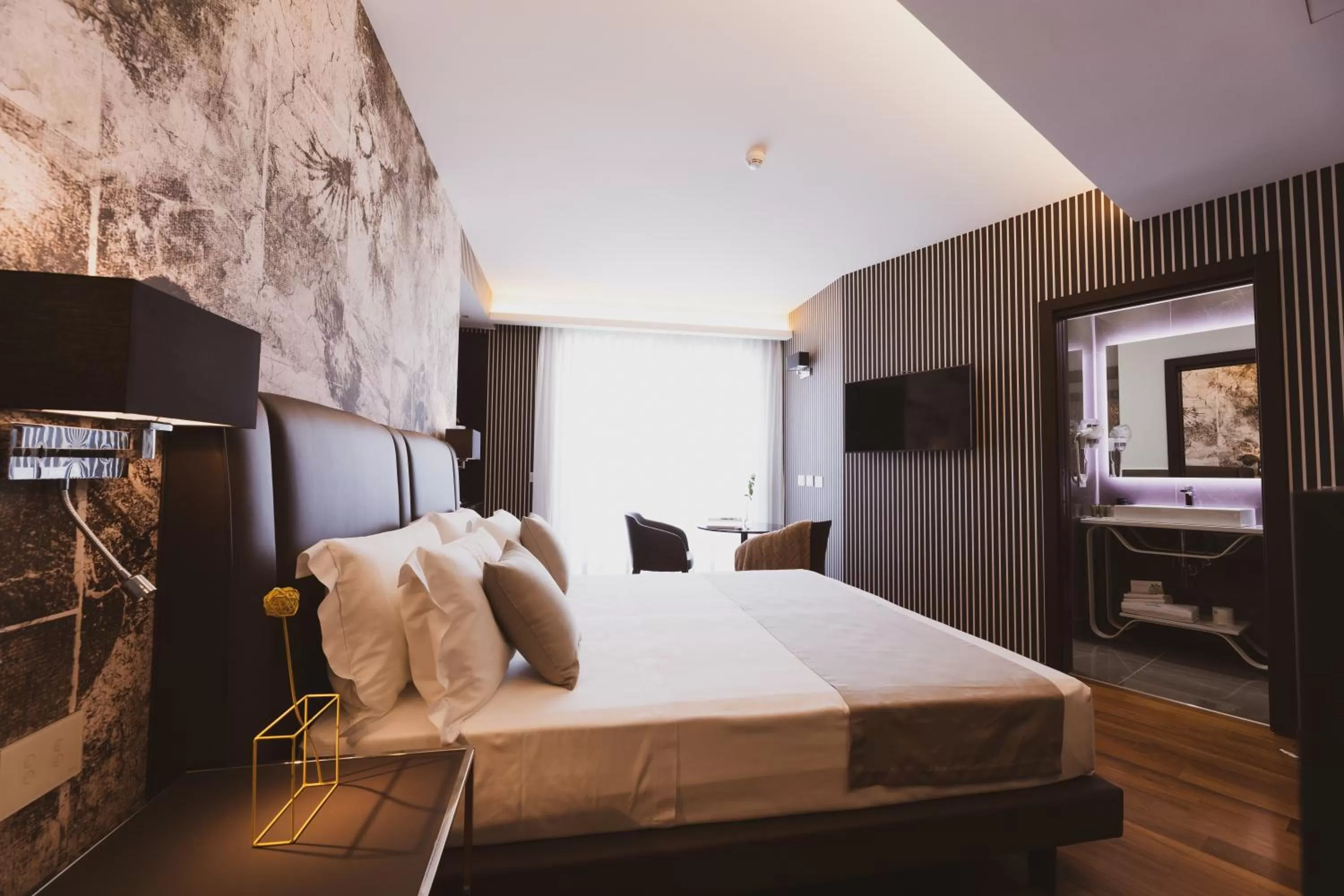 Bed in Callistos Hotel & Spa