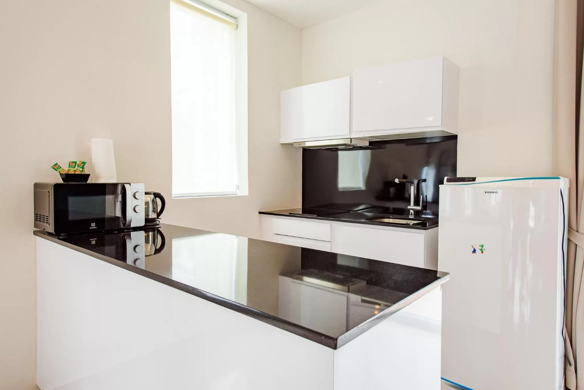 Kitchen or kitchenette in The Beach Village Resort