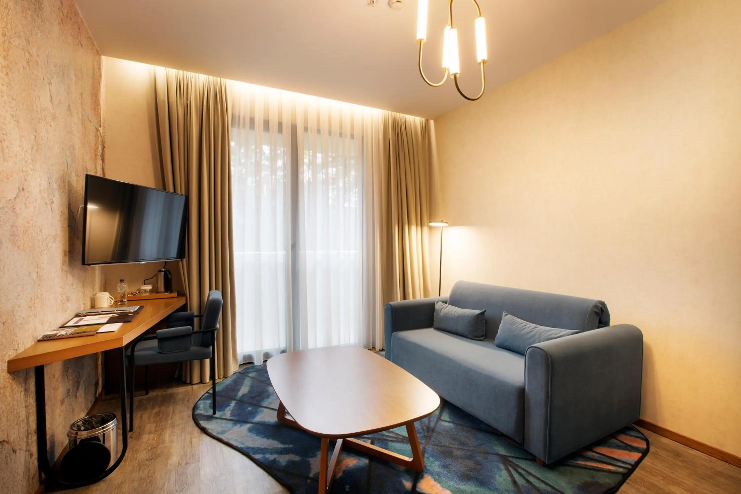Communal lounge/ TV room in Mercure Istanbul Bakirkoy