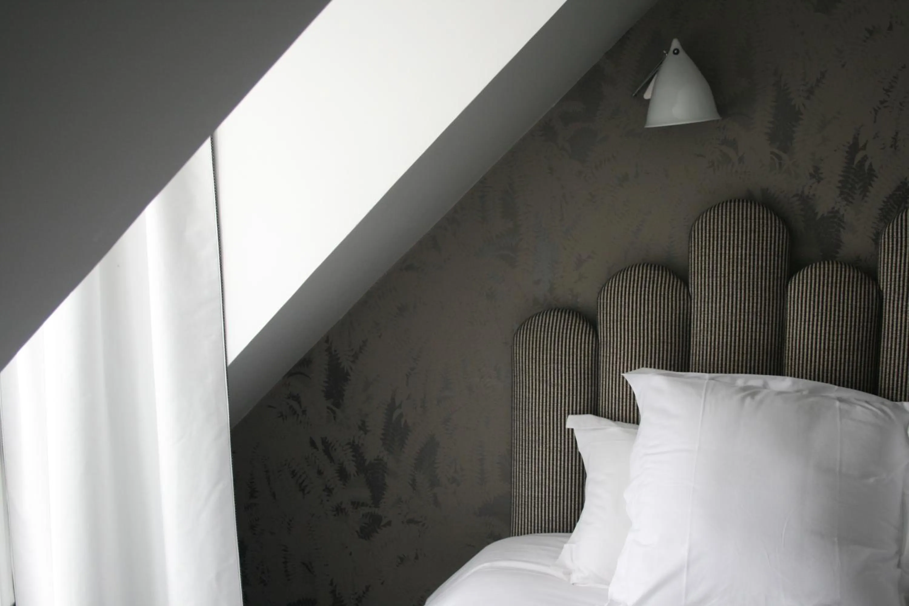 Bed in Hotel Paradis