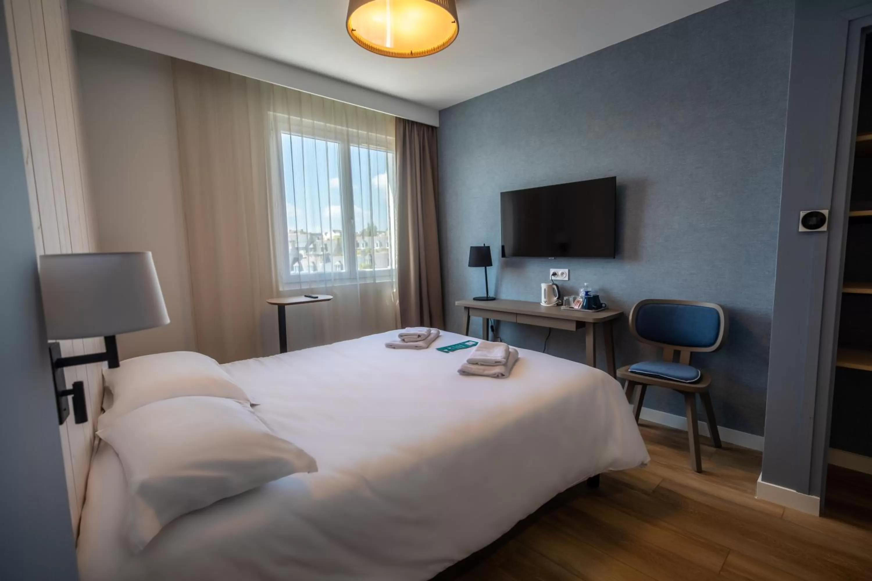 Bed in Hôtel de la Baie