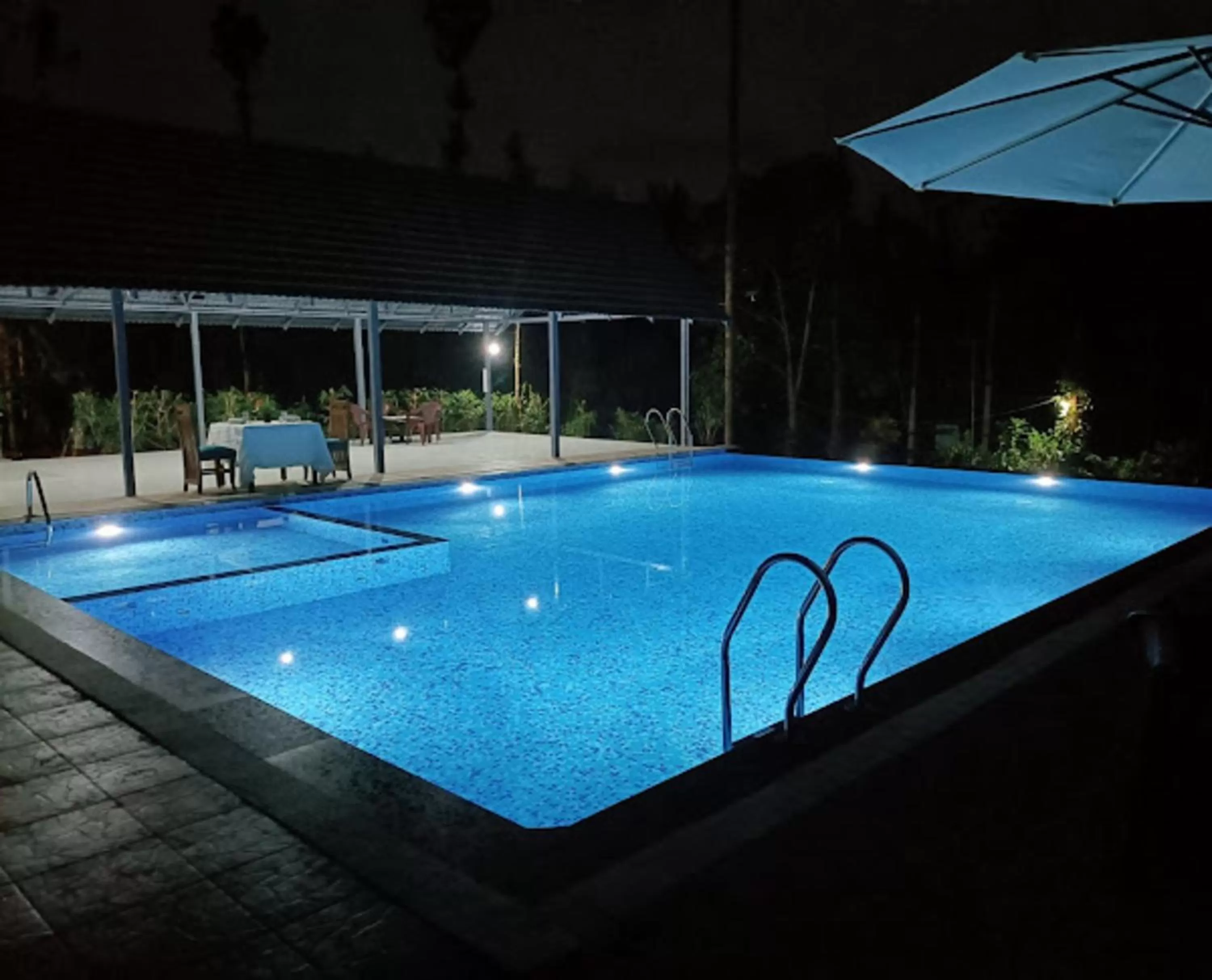 Swimming pool in The Spectrum Resort - Chikmagalur