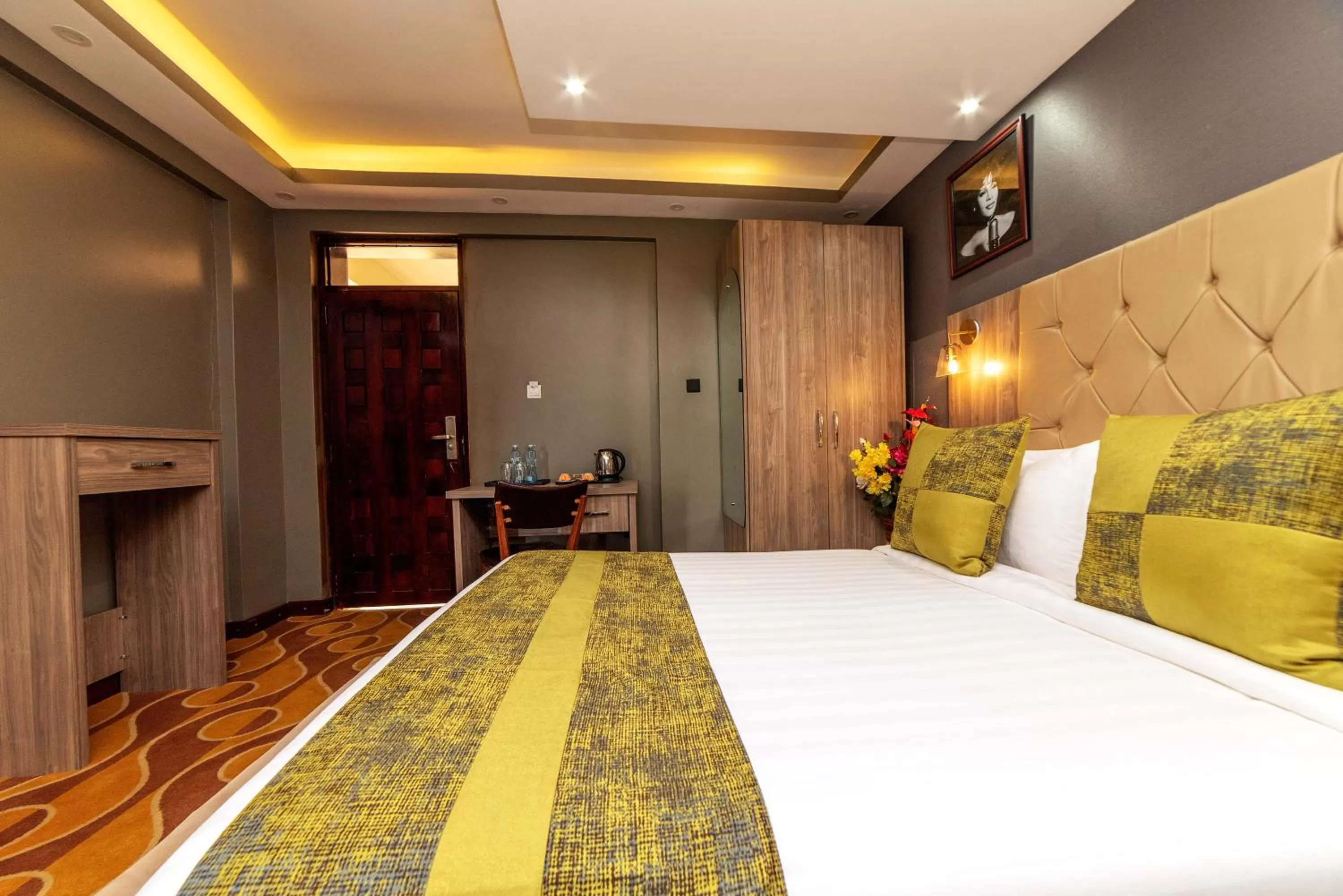 Bed in Afro Park Hotel