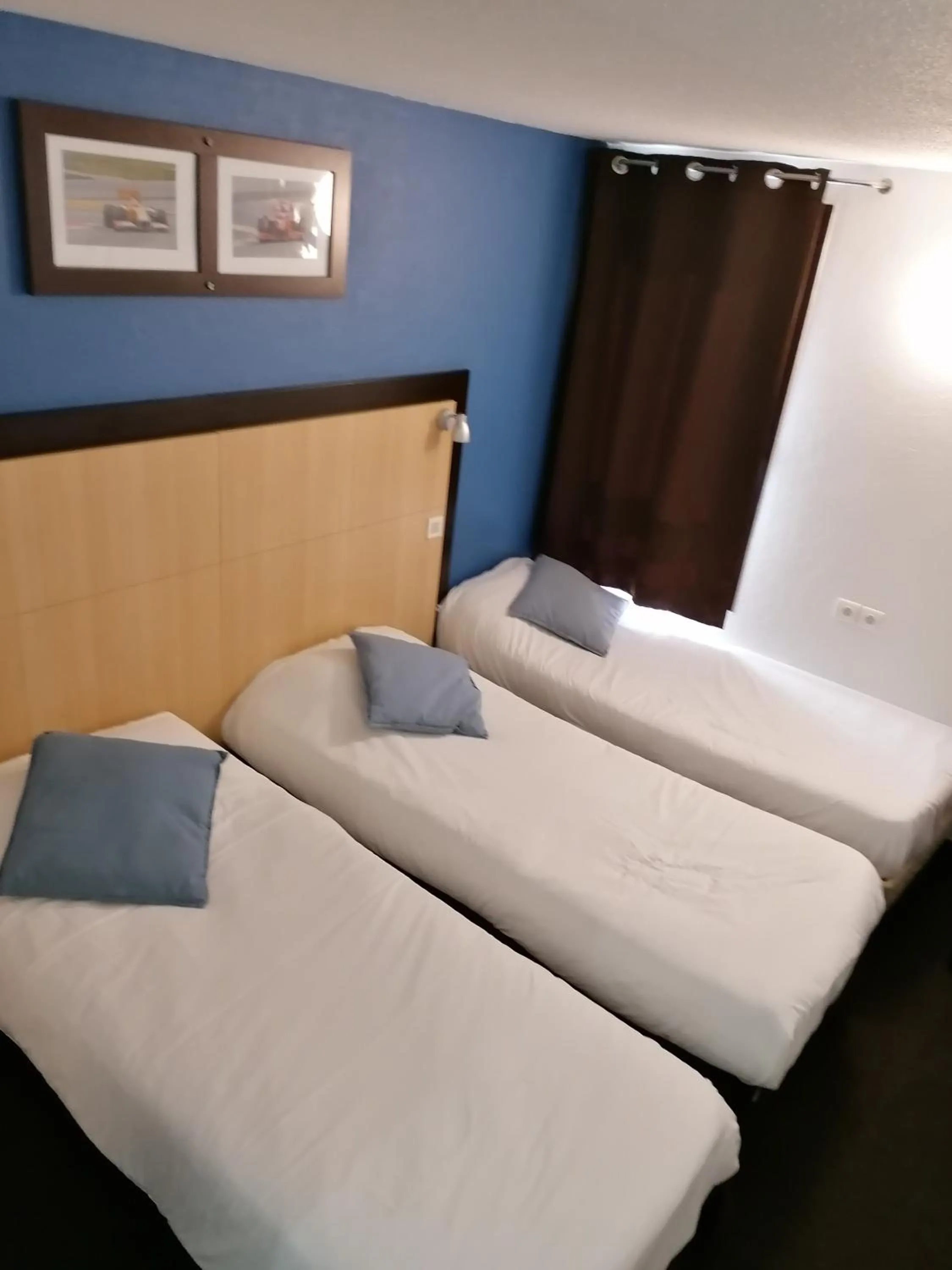 Bed in Enzo Hotels Vierzon by Kyriad Direct