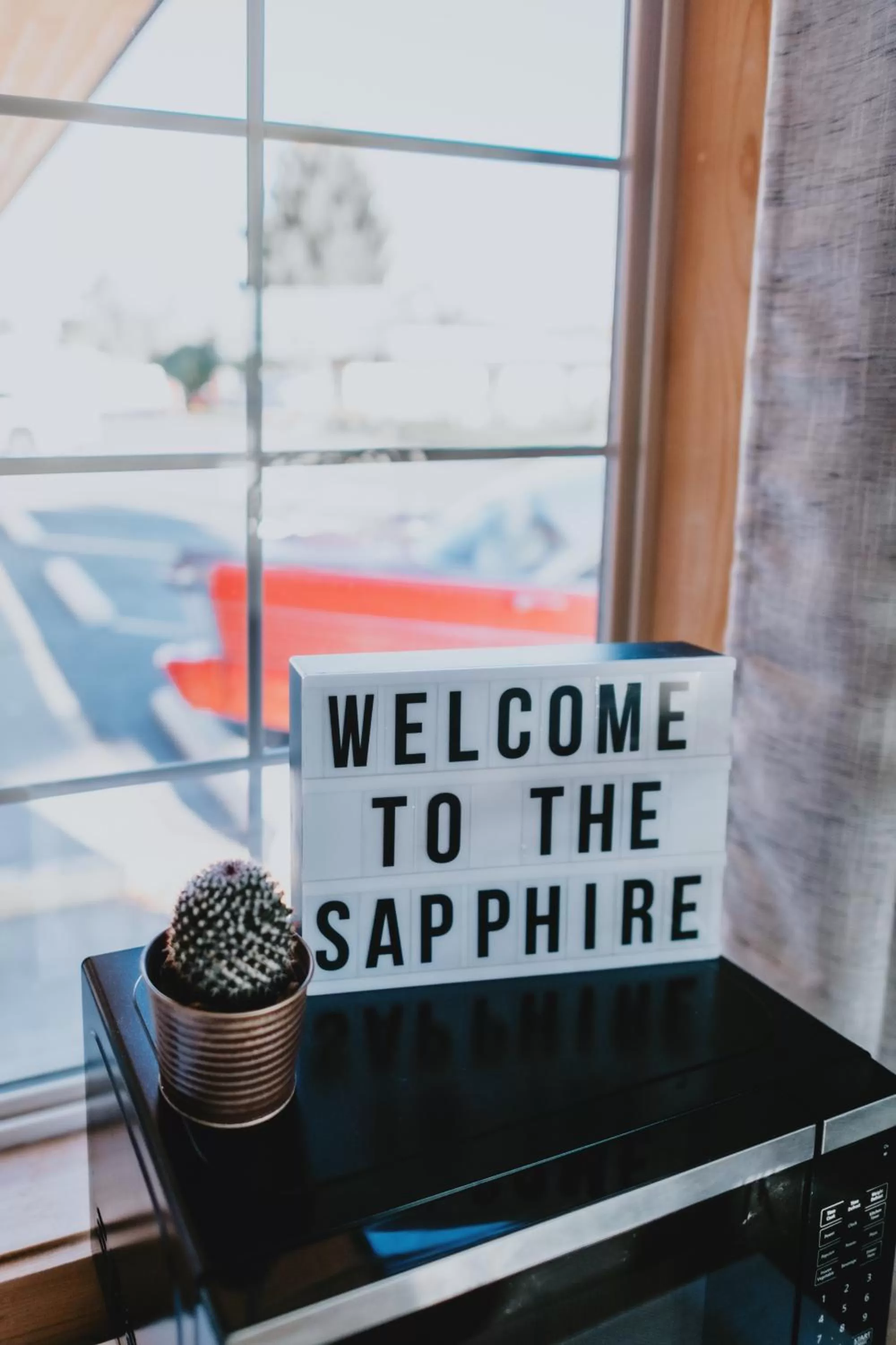 Property logo or sign in Sapphire Motel Midtown Bozeman