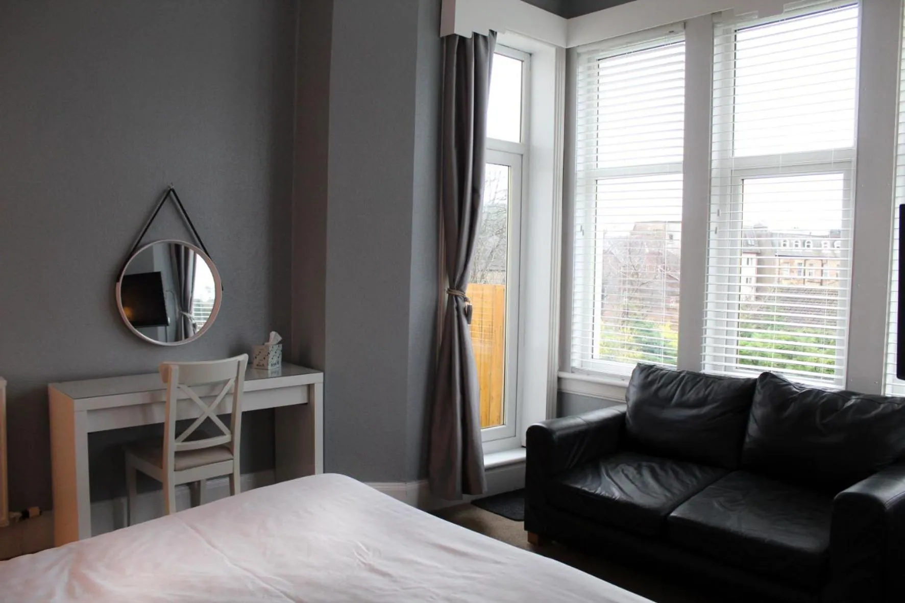 Bed in The Woodhouse Hotel