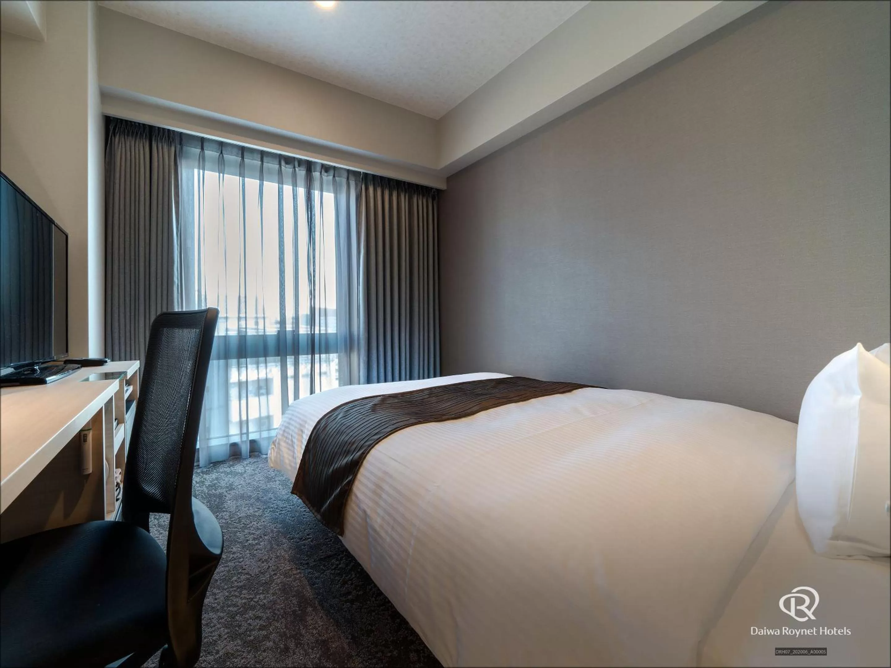 Bed in DEL style Fukuoka Nishinakasu by Daiwa Roynet Hotel