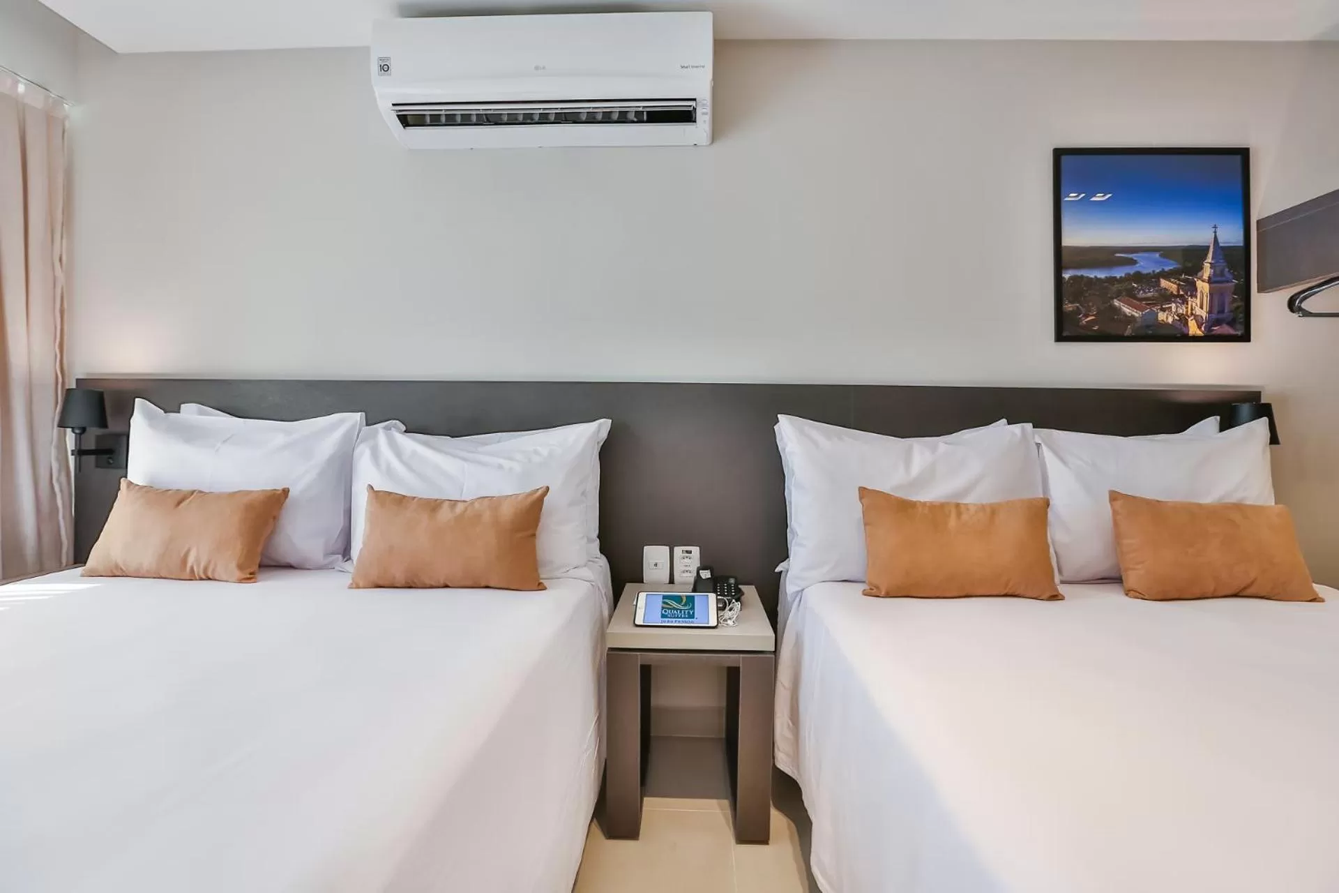 Bed in Quality Suítes João Pessoa