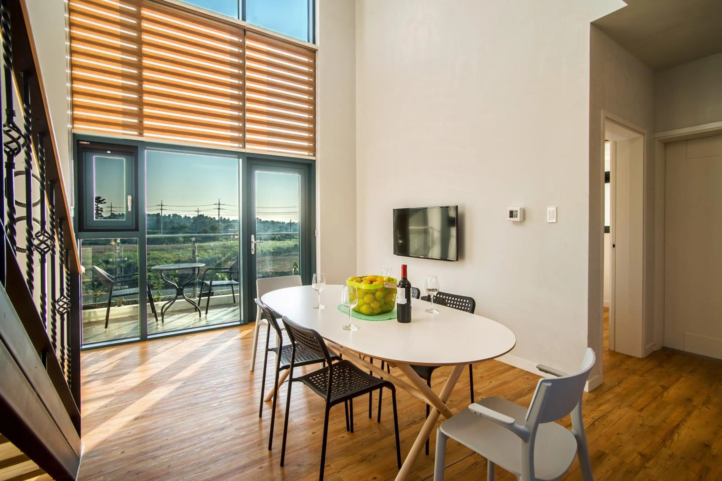 Communal lounge/ TV room in Poema Stay Pension