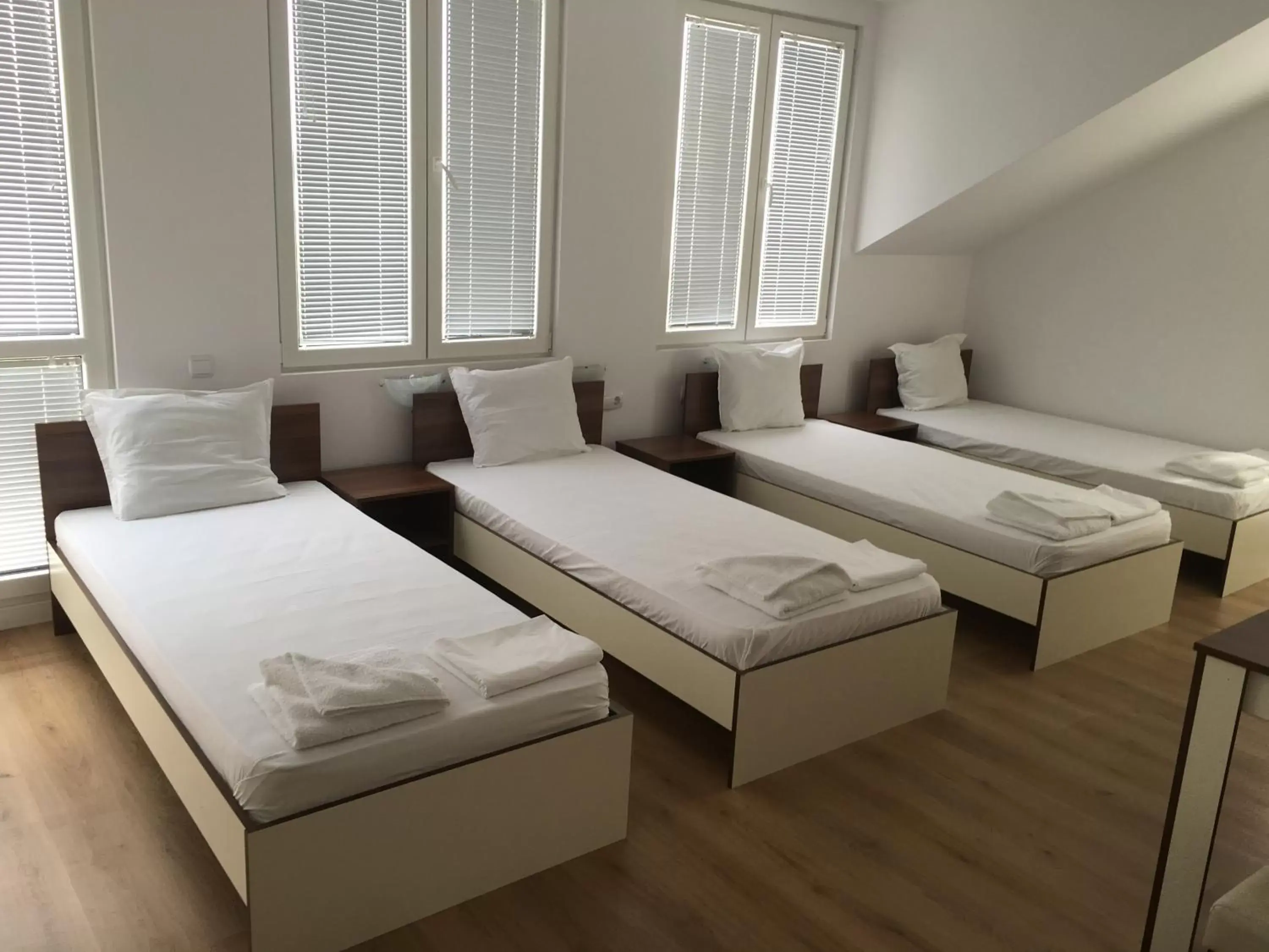 Quadruple Room with Bathroom in By The River Hotel Quadruple Room with Bathroom in By The River Hotel