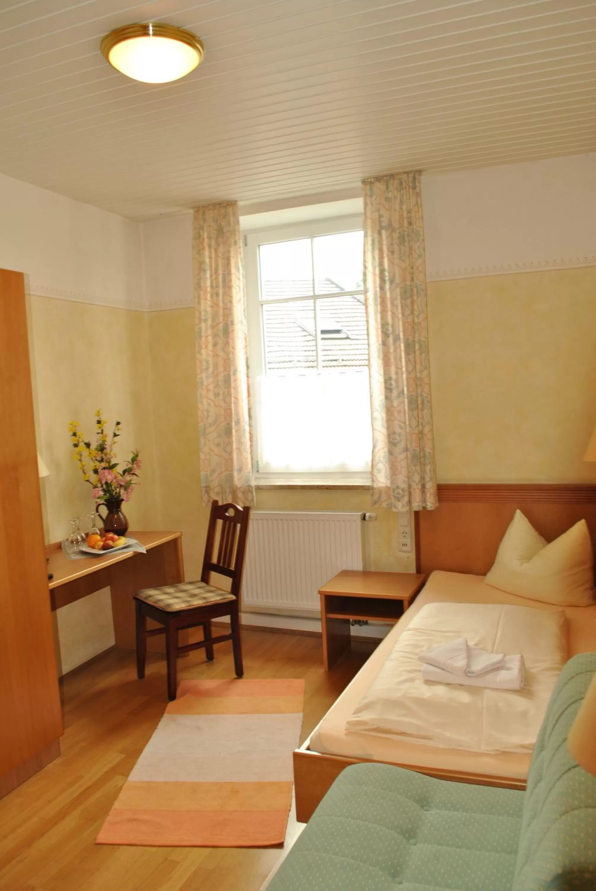 Photo of the whole room, Bed in Gasthof Kampenwand Aschau