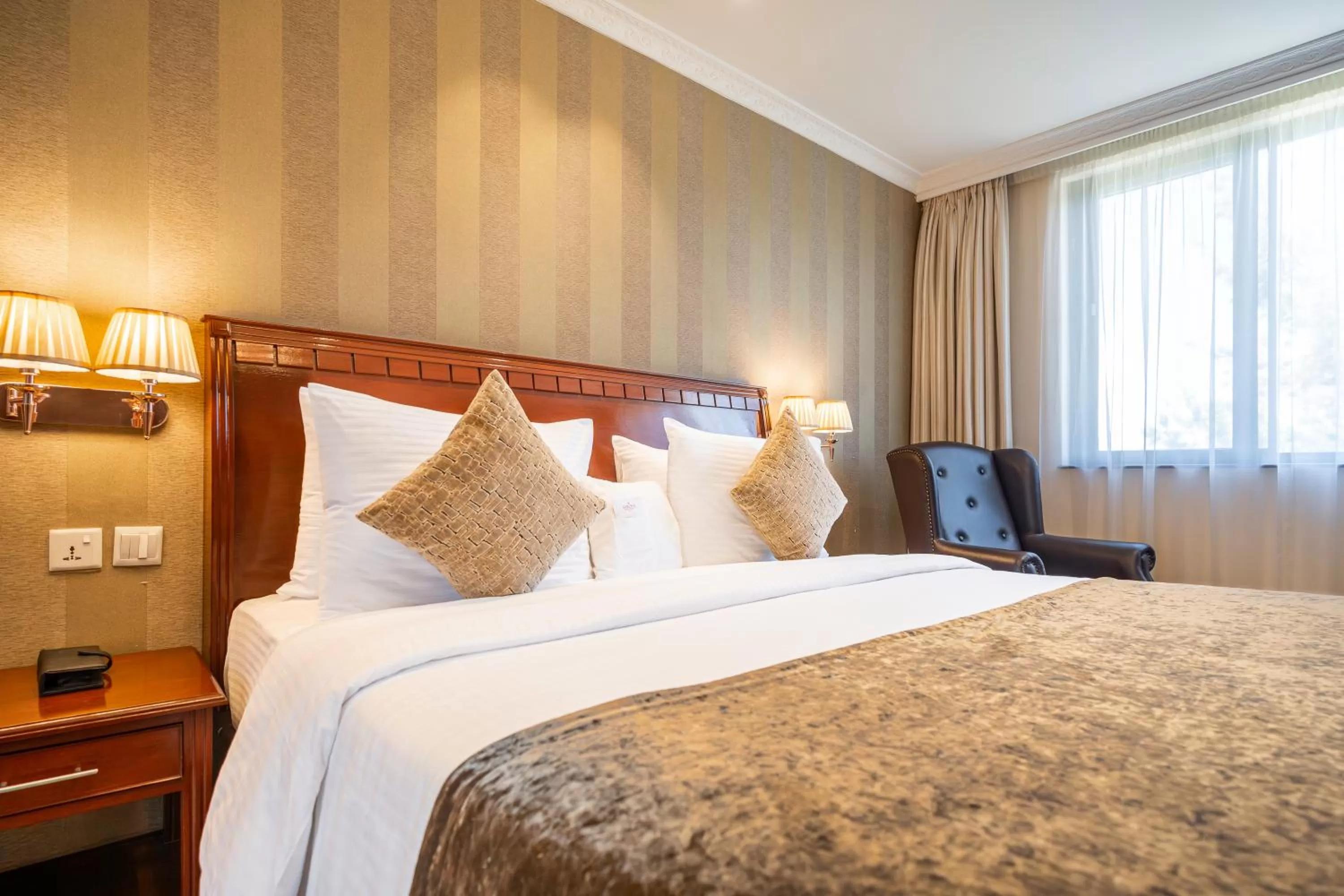 Bed in Sarova Woodlands Hotel and Spa