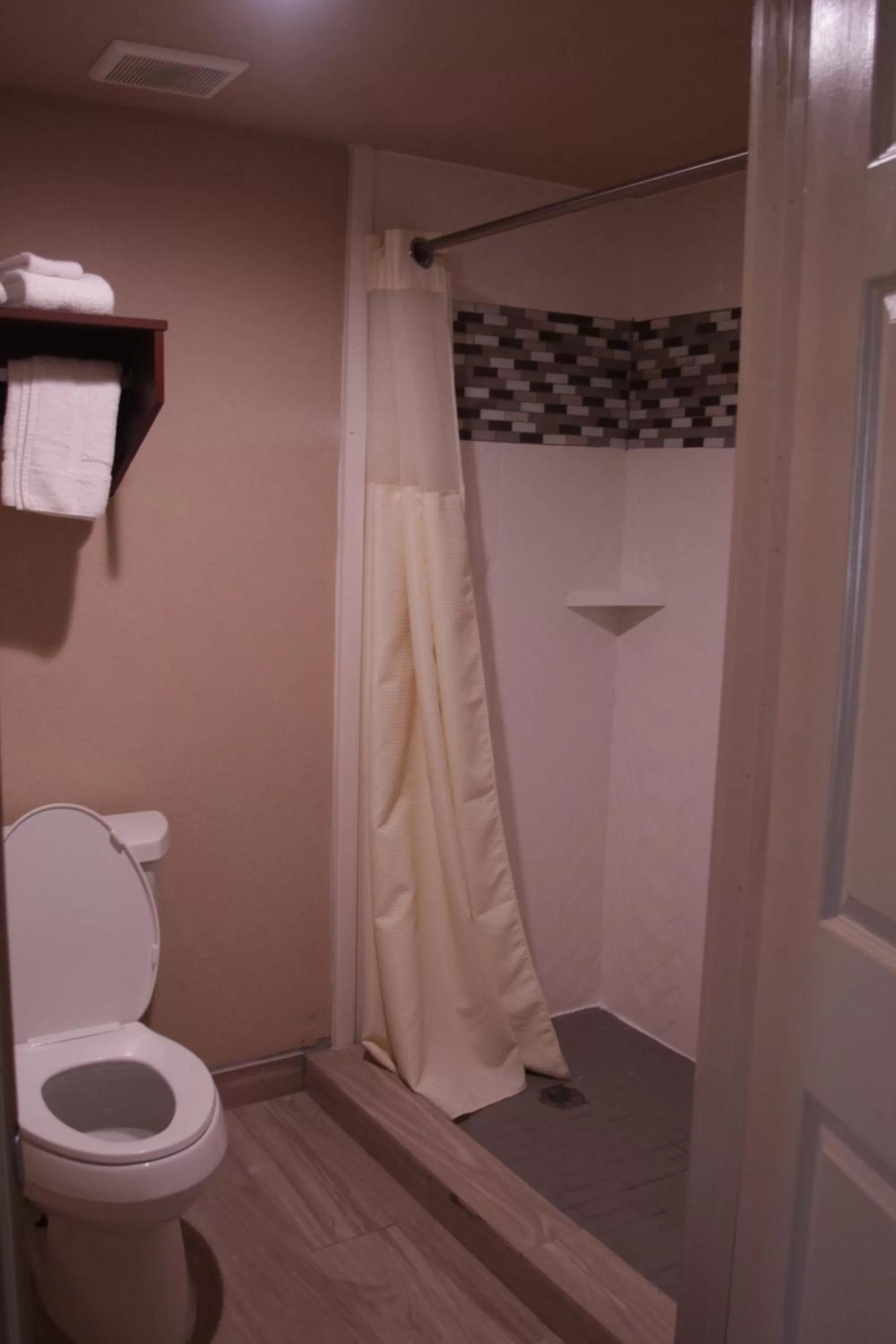 Toilet in Americas Best Value Inn Port Aransas