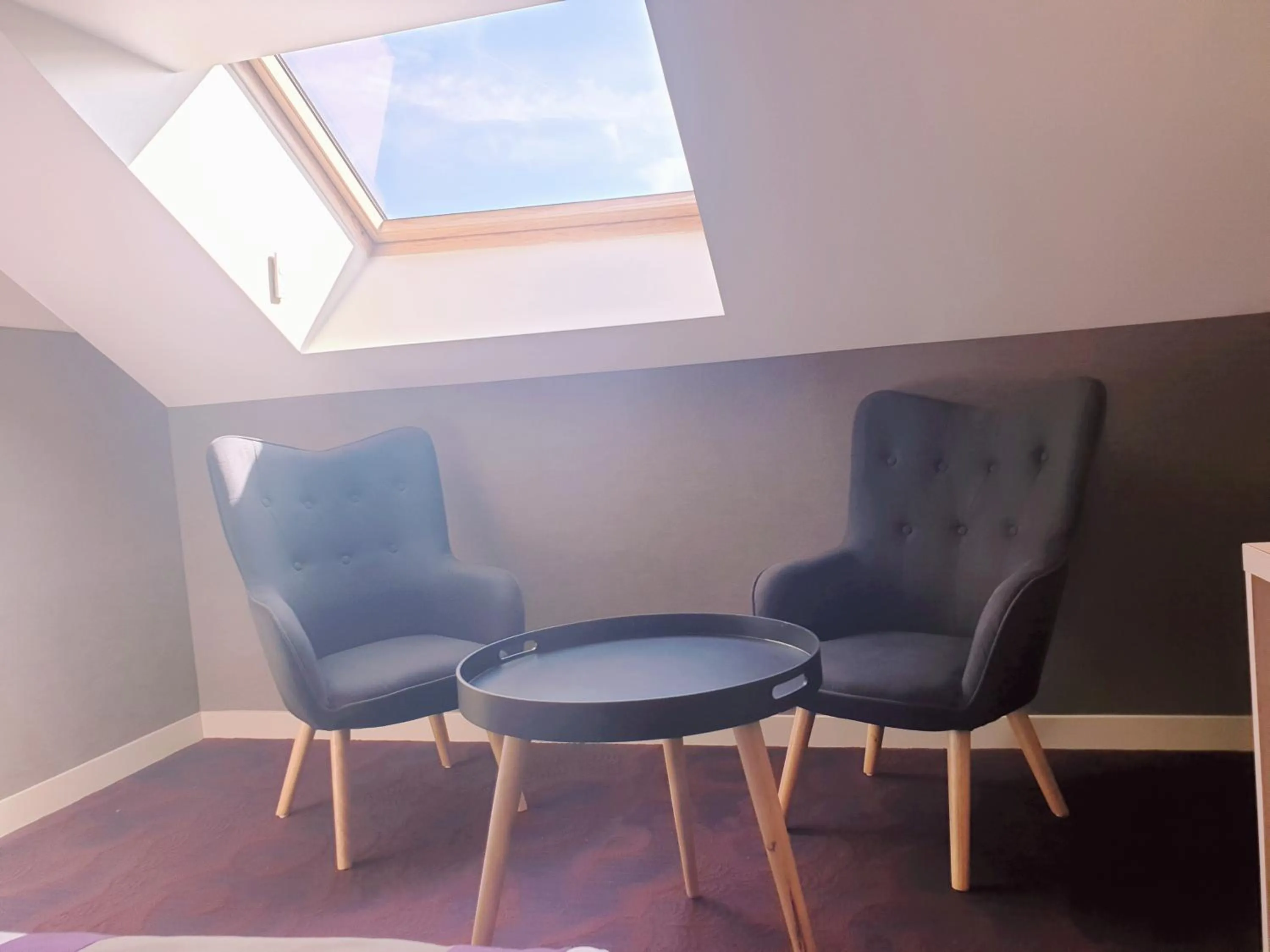 Seating area in Hôtel Brésil Opéra SPA