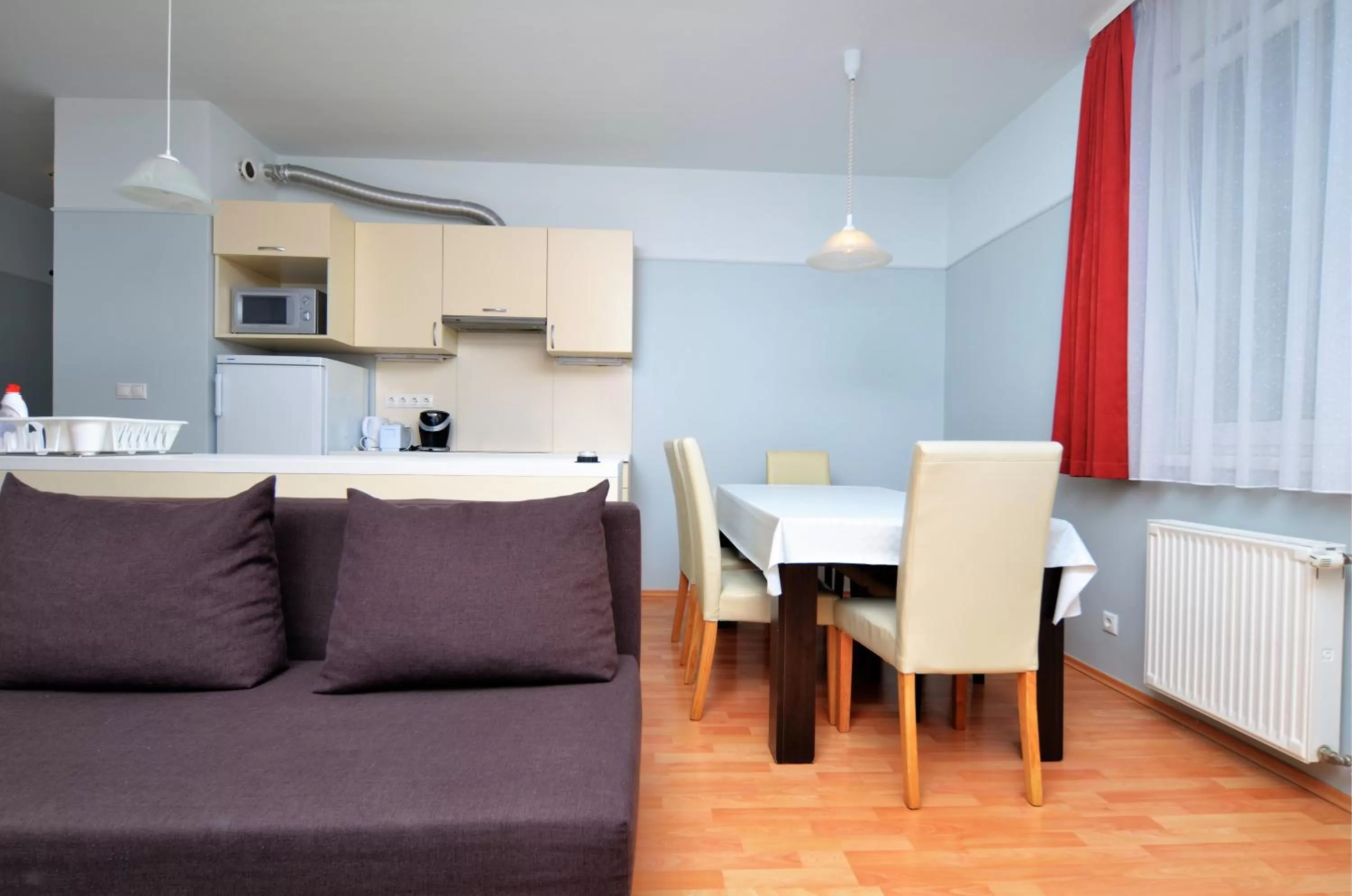 Kitchen or kitchenette in Agape Apartments