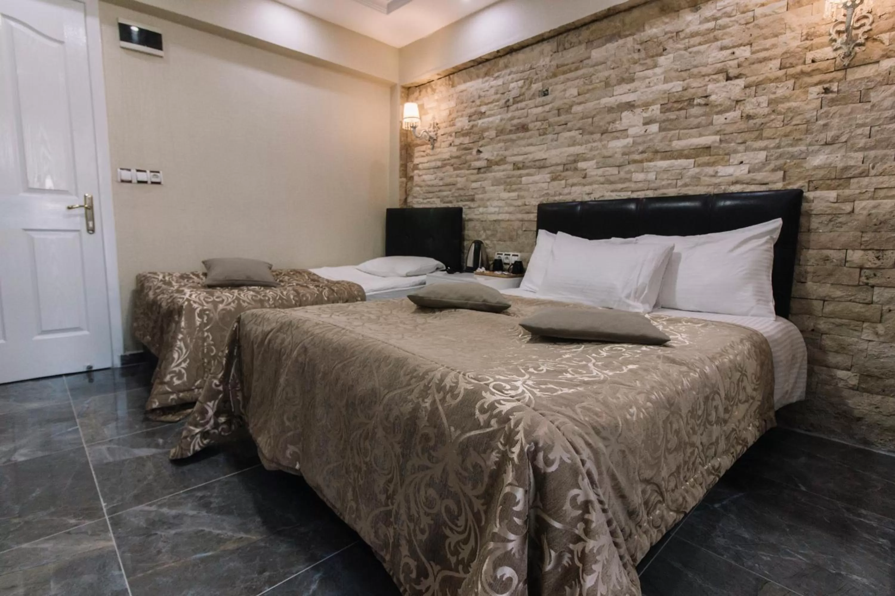 Bed in Melrose Pansiyon