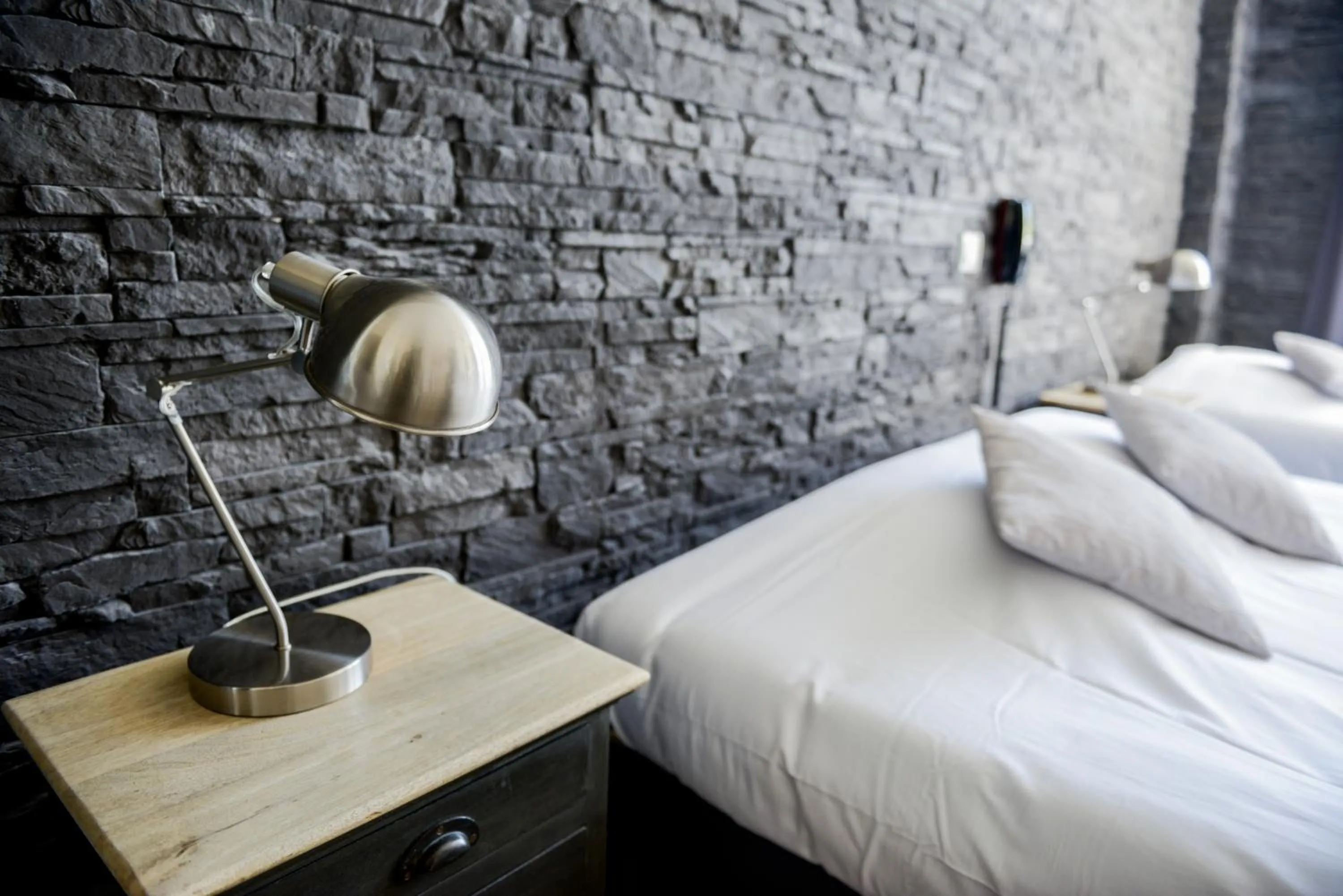 Bed in Logis Le Saint Hubert