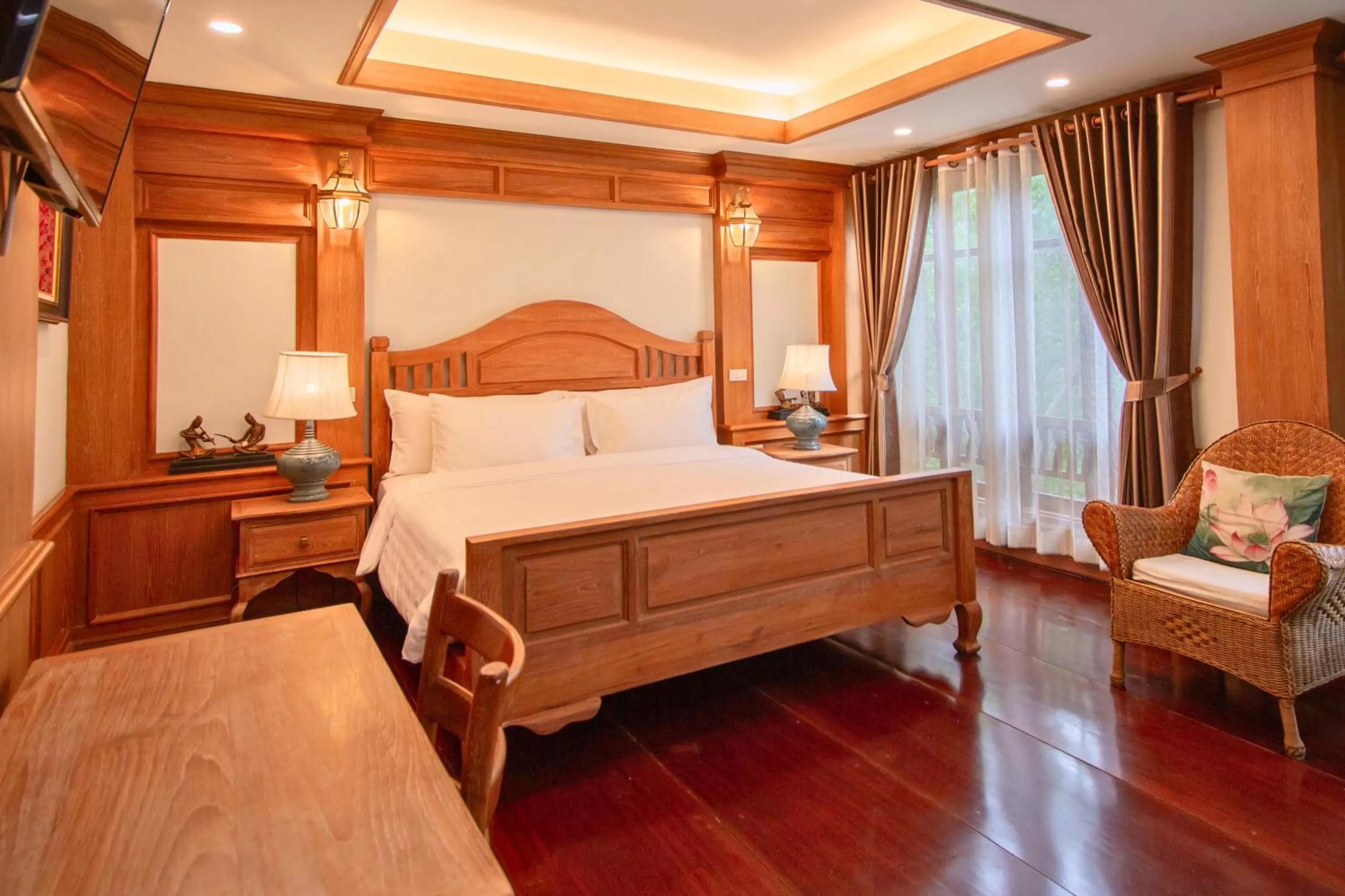 Bed in Rich Garden House Hotel