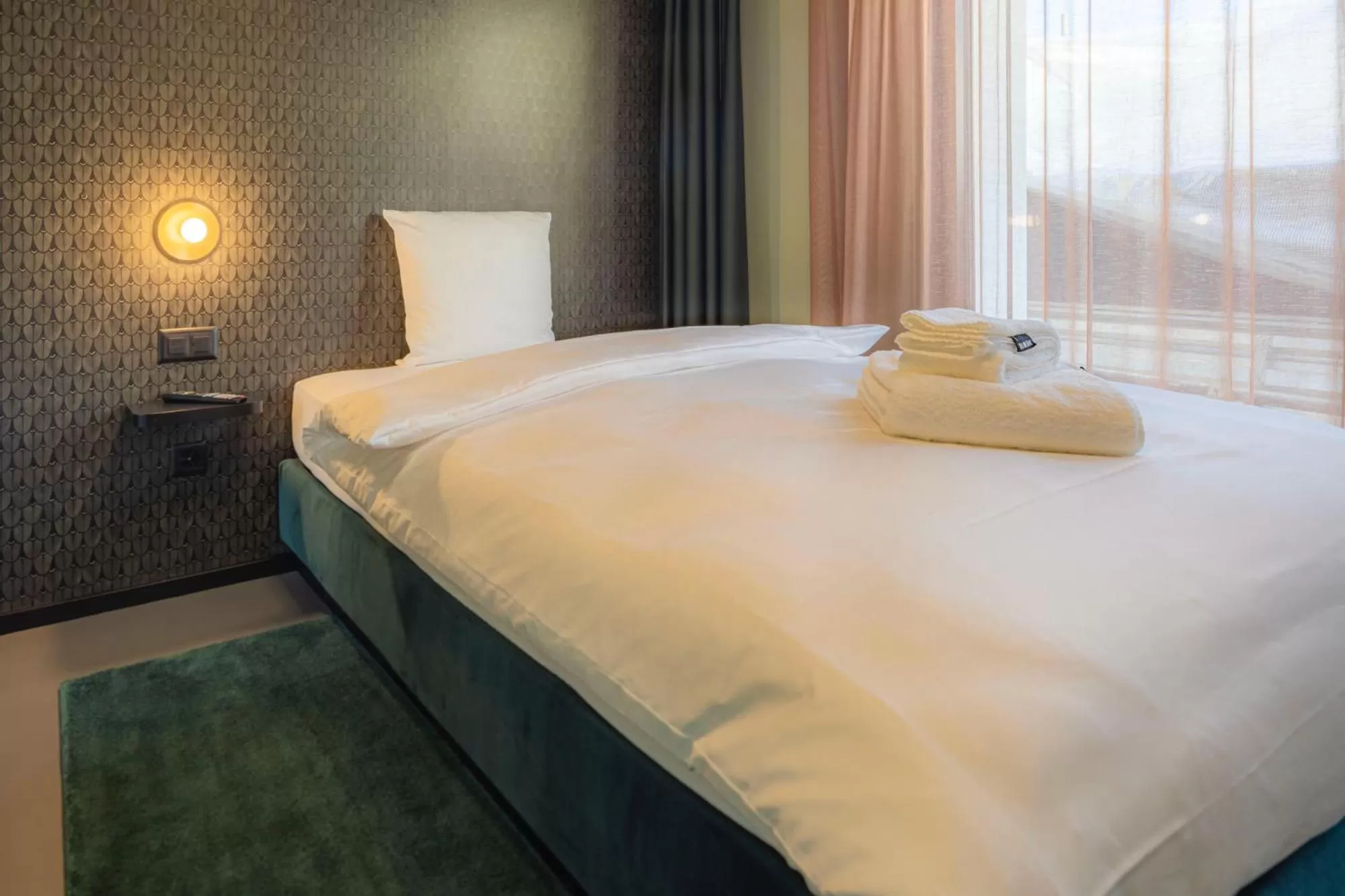 Photo of the whole room, Bed in BLOOM Boutique Hotel & Lounge Basel