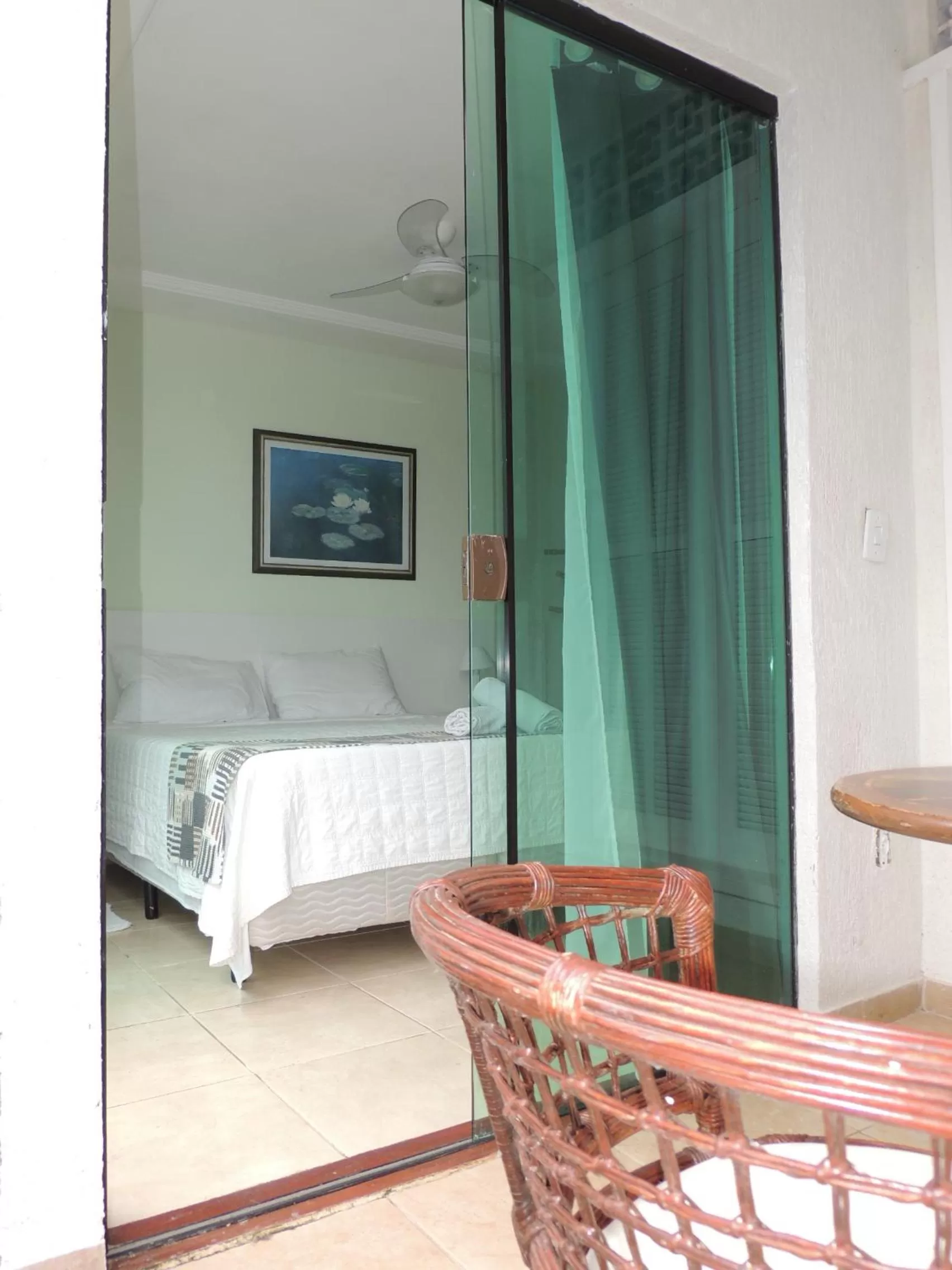 Seating area, Bed in Pousada Akaroa