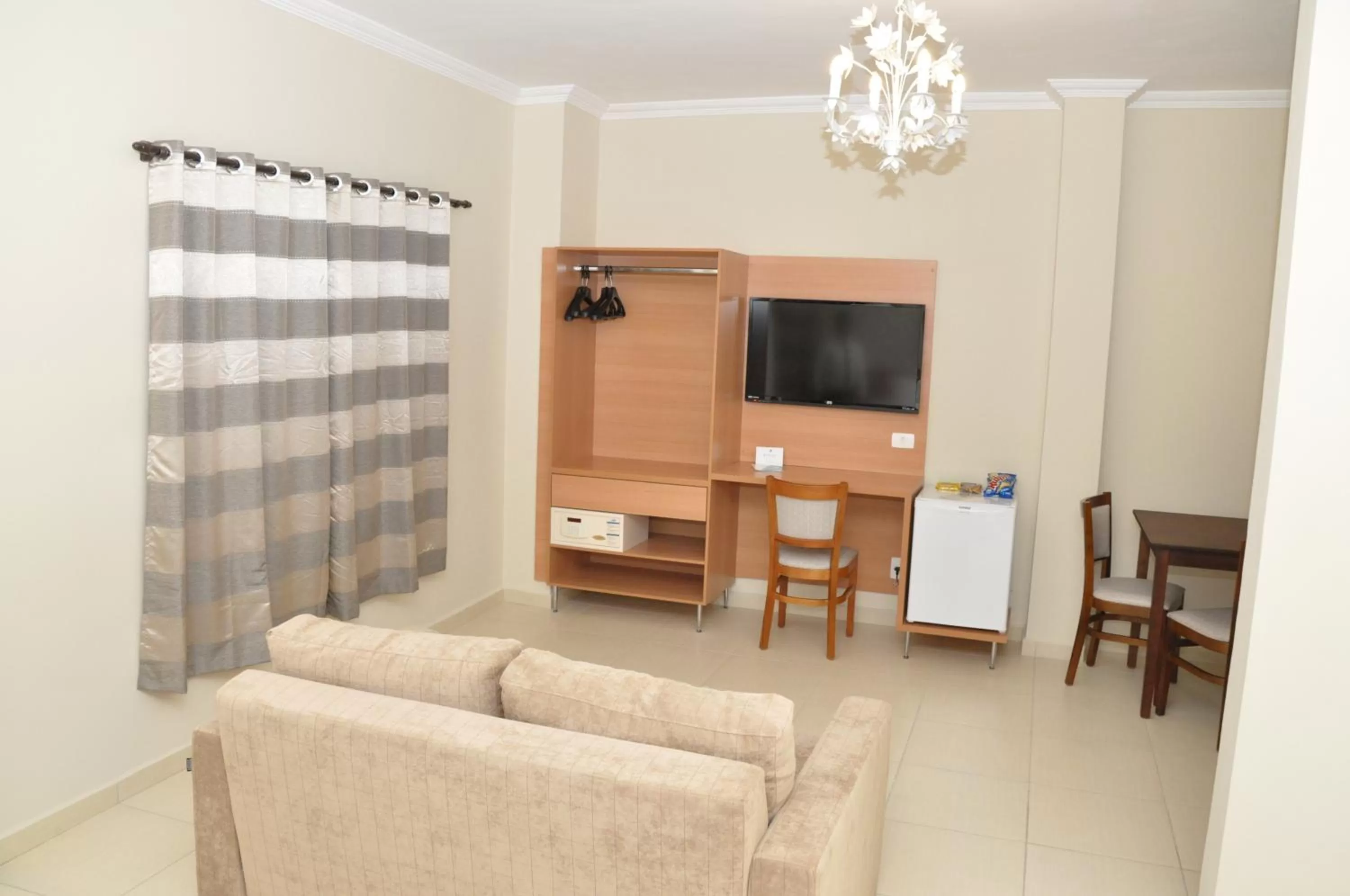 TV and multimedia in Lotus Hotel - à 6 km do Santuário de Aparecida-SP