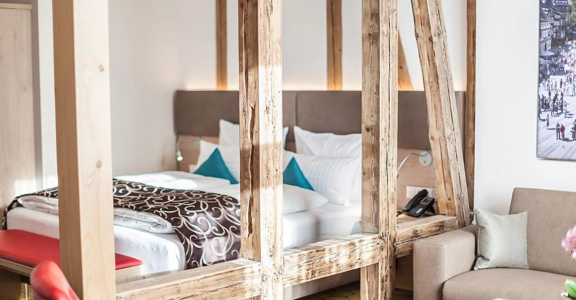 Photo of the whole room, Bed in AKZENT Hotel Villa Saxer