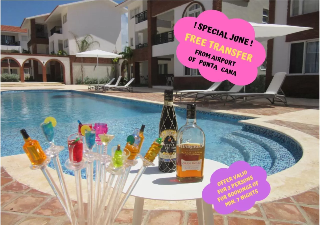 Swimming Pool in Coral Village - "Caribbean Cocktails" Deluxe Suites & Pool