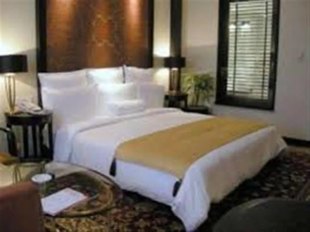 Bed in Hotel Marcopolo