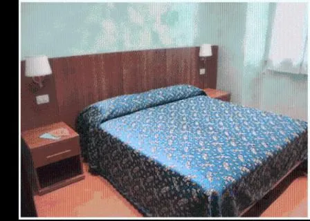 Bed in Hotel Ferraro