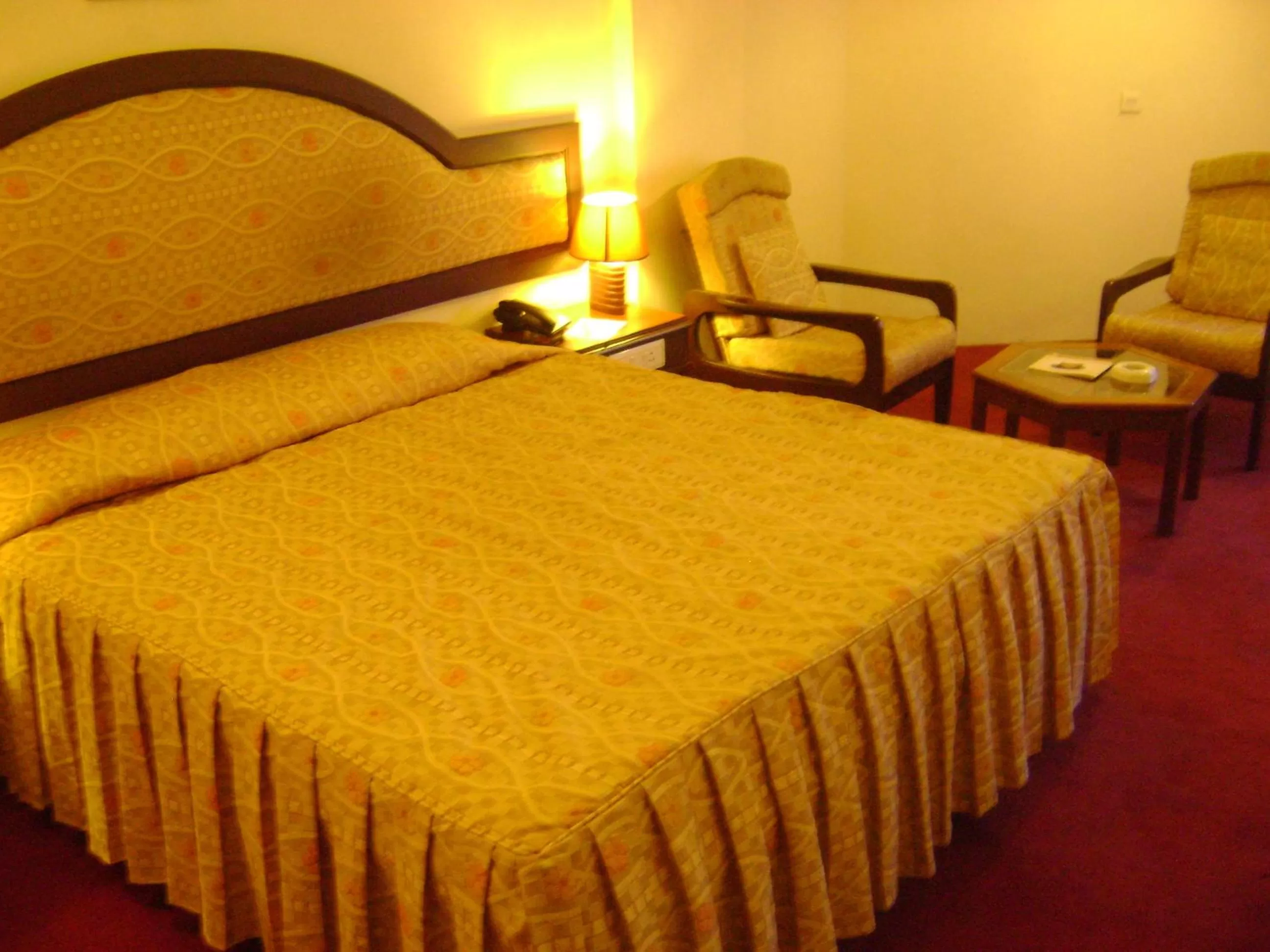 Bed in Manuelsons Malabar Palace