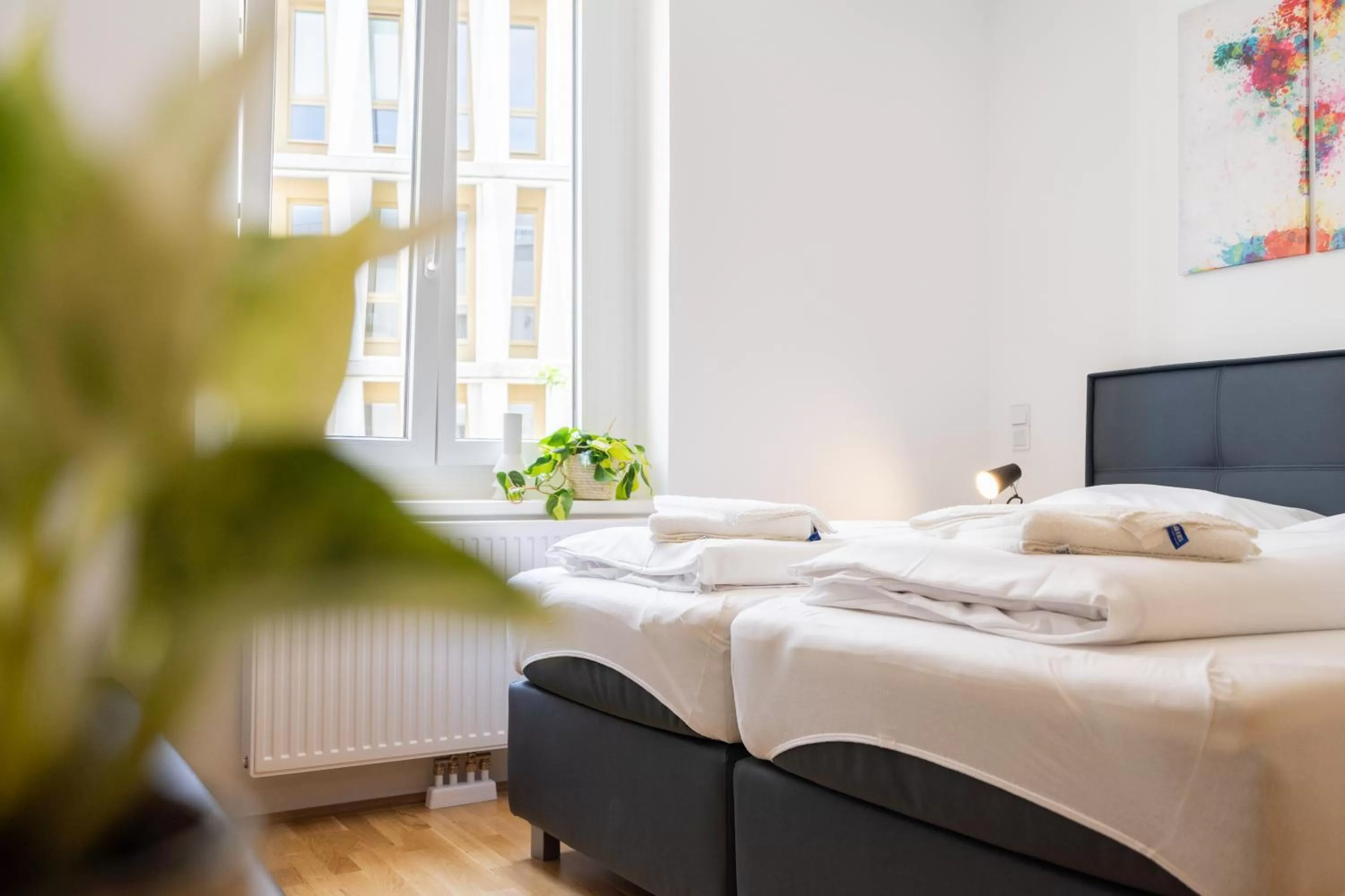 Bed in FeelGood Apartments SmartLiving | contactless check-in