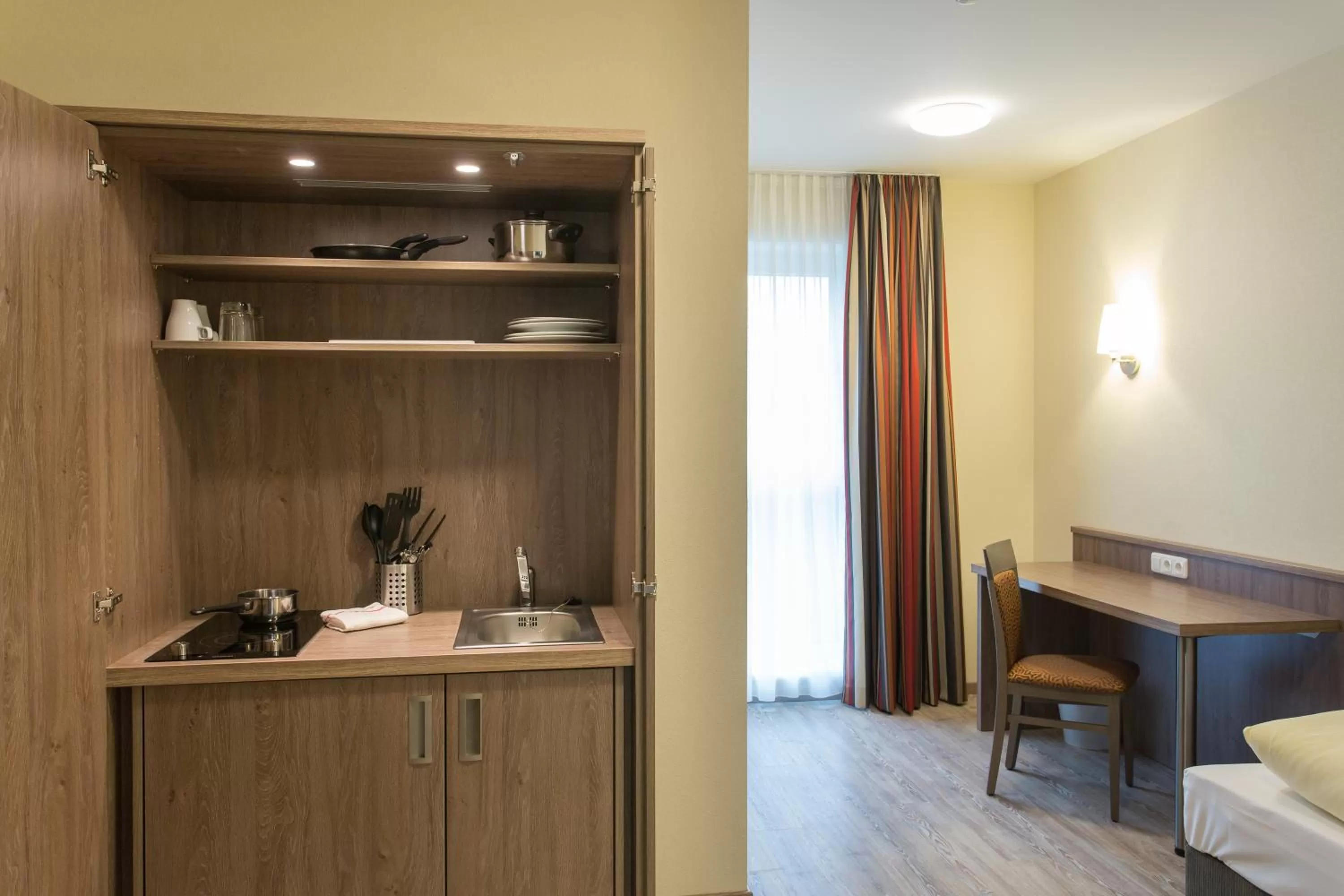 Kitchen or kitchenette in CityApart Hotel