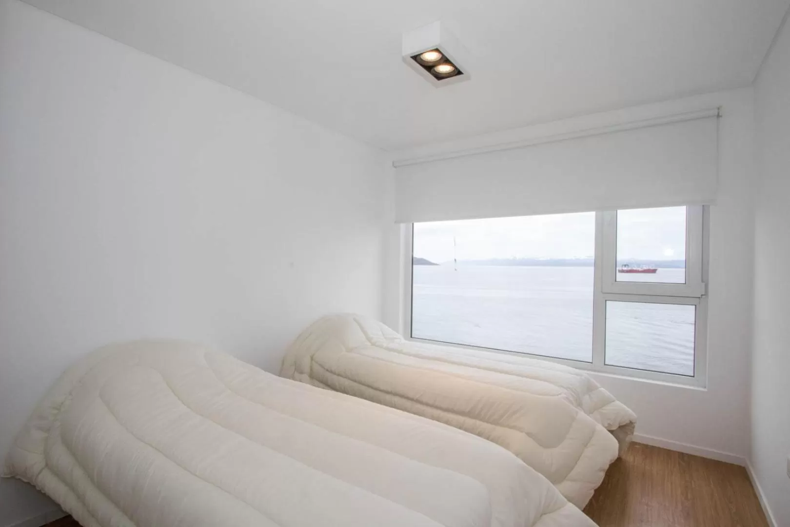 Bed in De la Costa Apartamentos