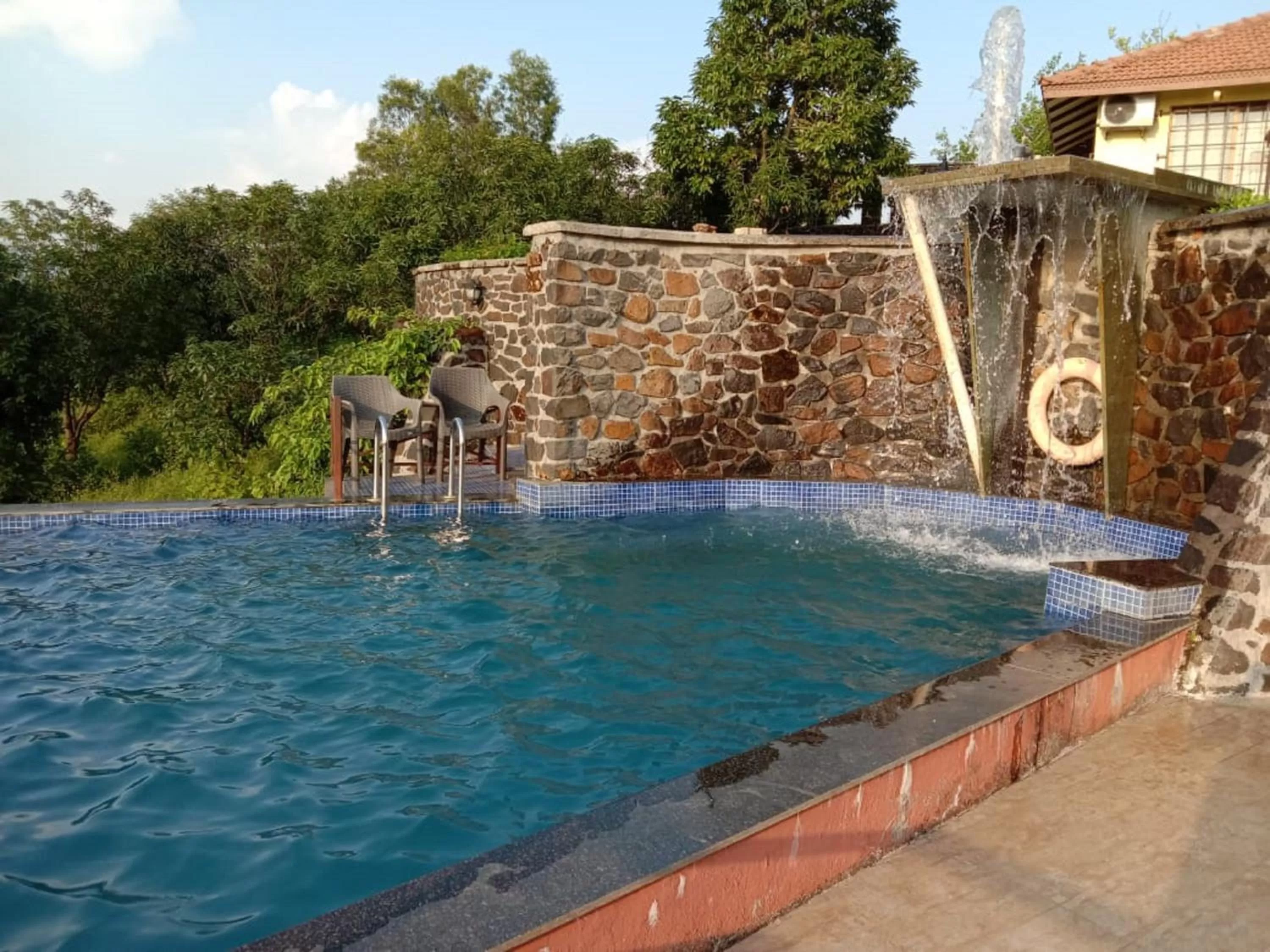 Swimming pool in Jayshin Lake Vaitarna Resort - Igatpuri