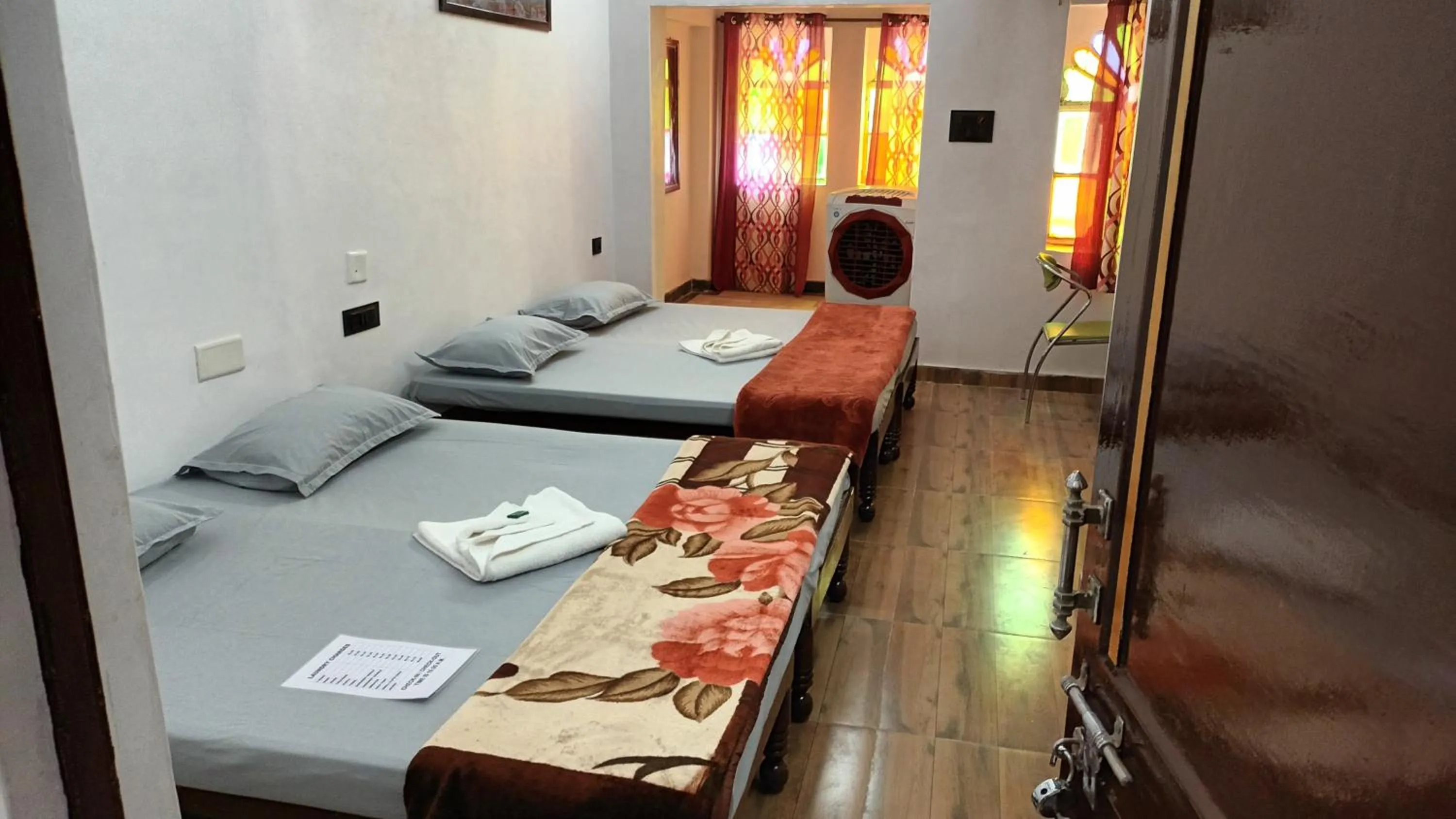 Bedroom, Bed in Jag Niwas Guest House & pure veg restaurant