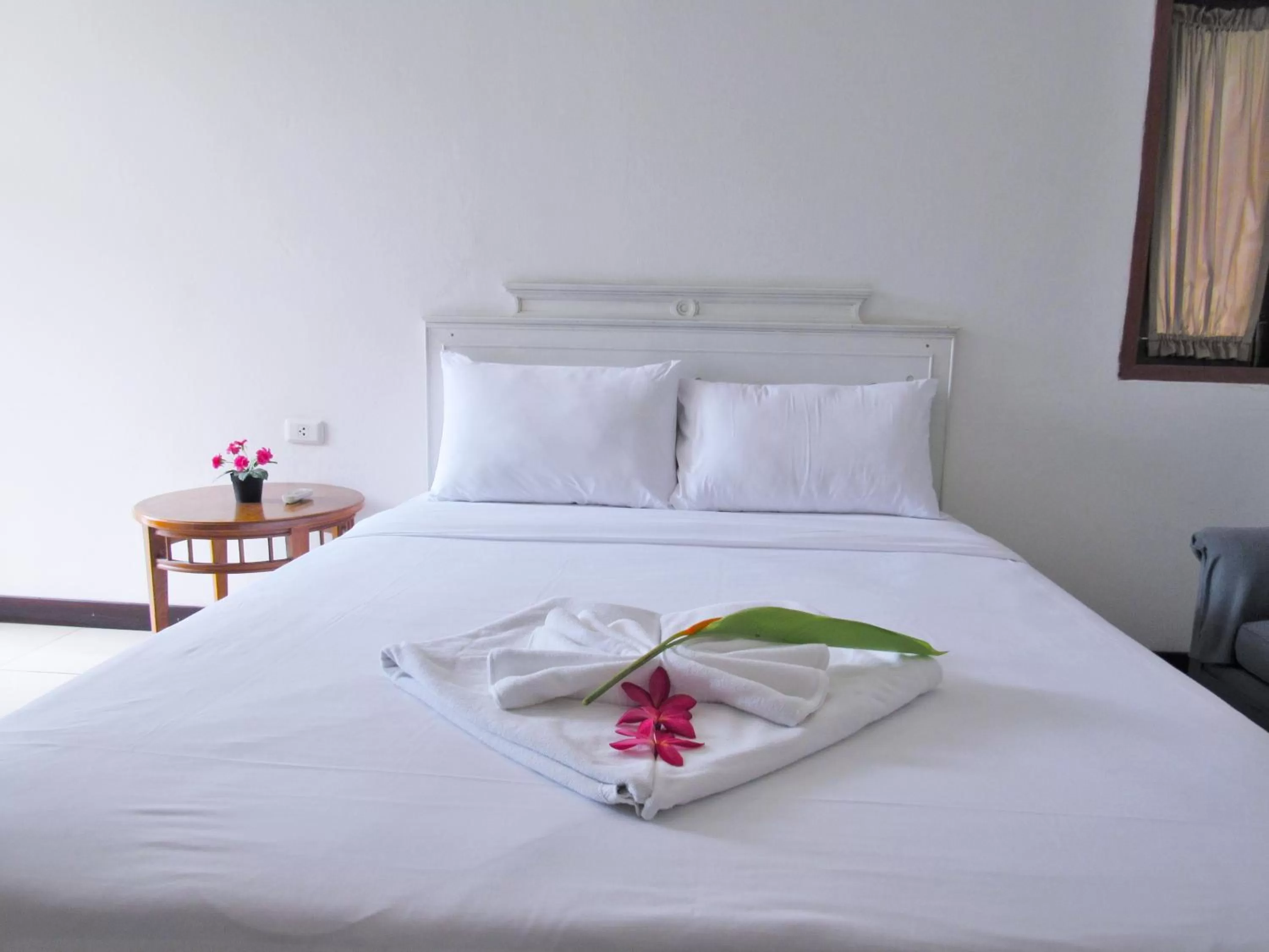 Bed in JL Bangkok Hotel