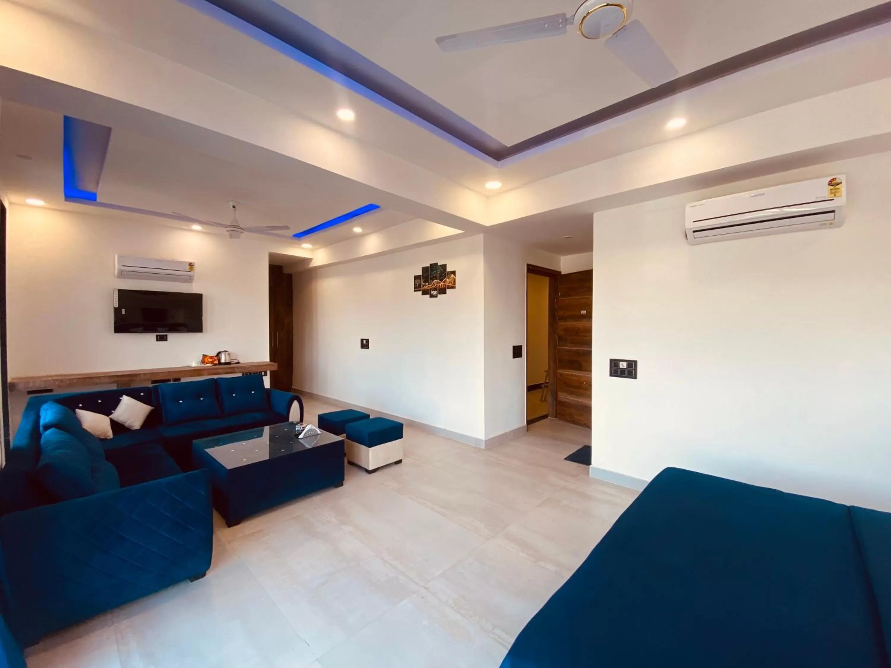 Bedroom, Seating Area in The Metro Stay By F9 Hotels-Near Sector 18 Metro Station Noida