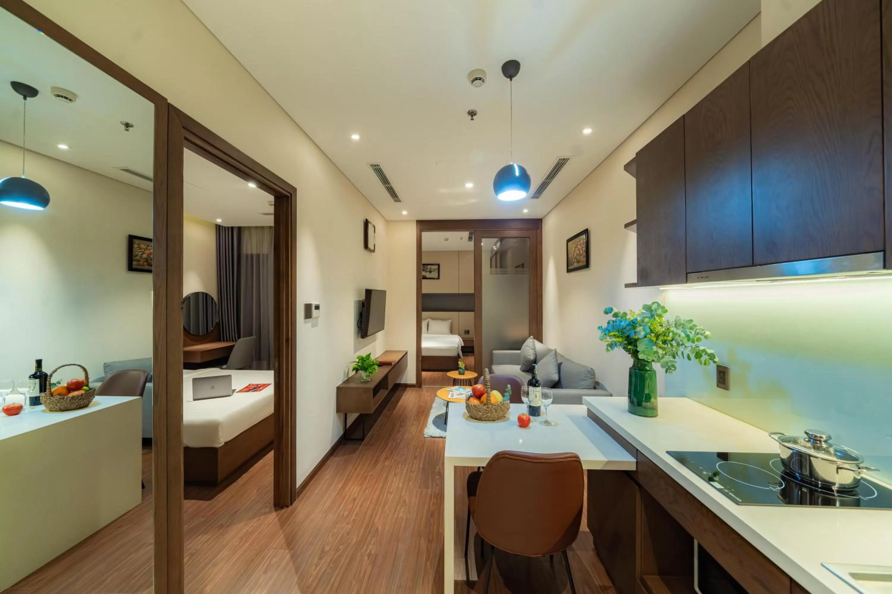 Kitchen or kitchenette, Bed in DHTS Business Hotel & Apartment