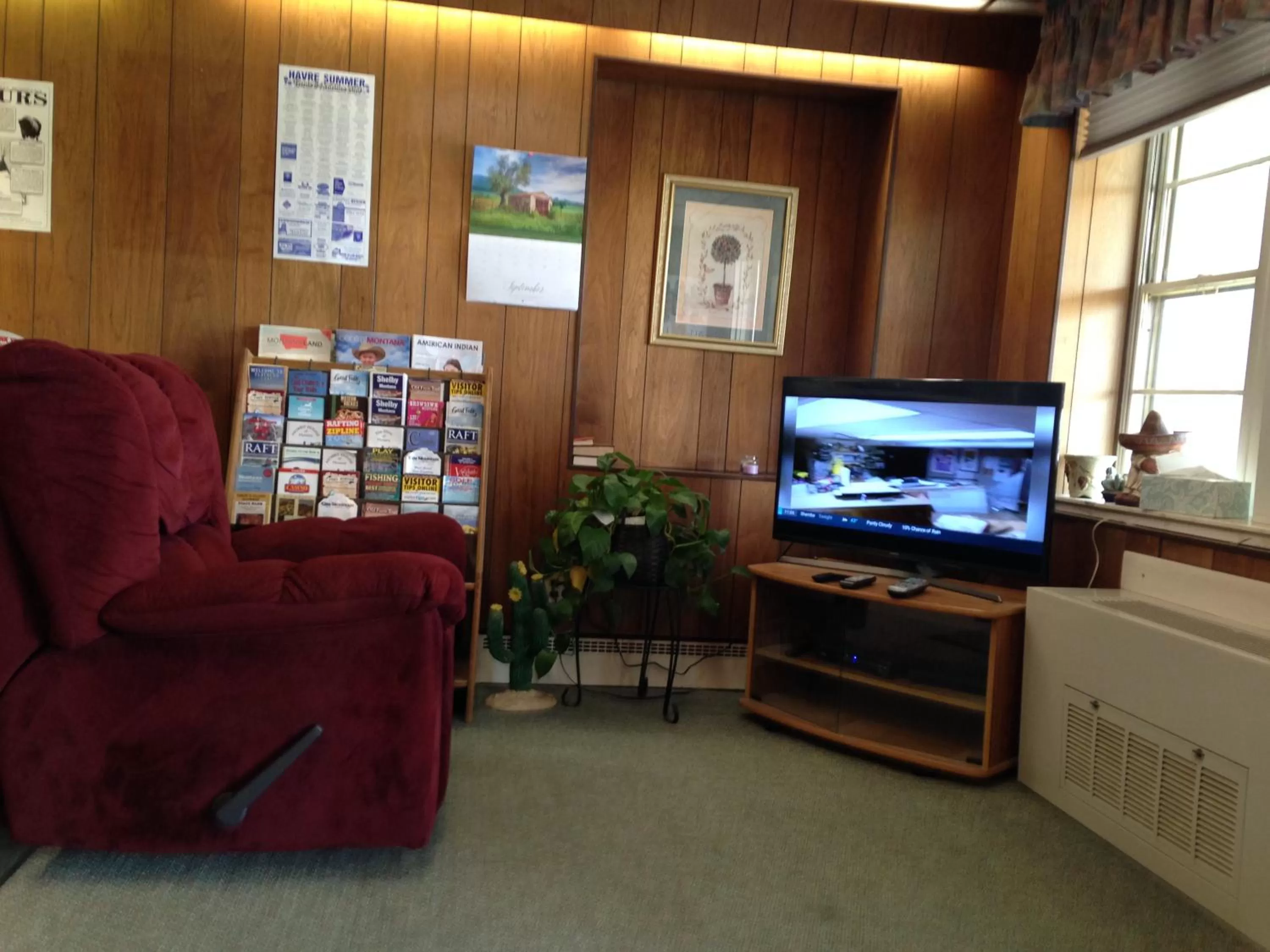Communal lounge/ TV room in Siesta Motel