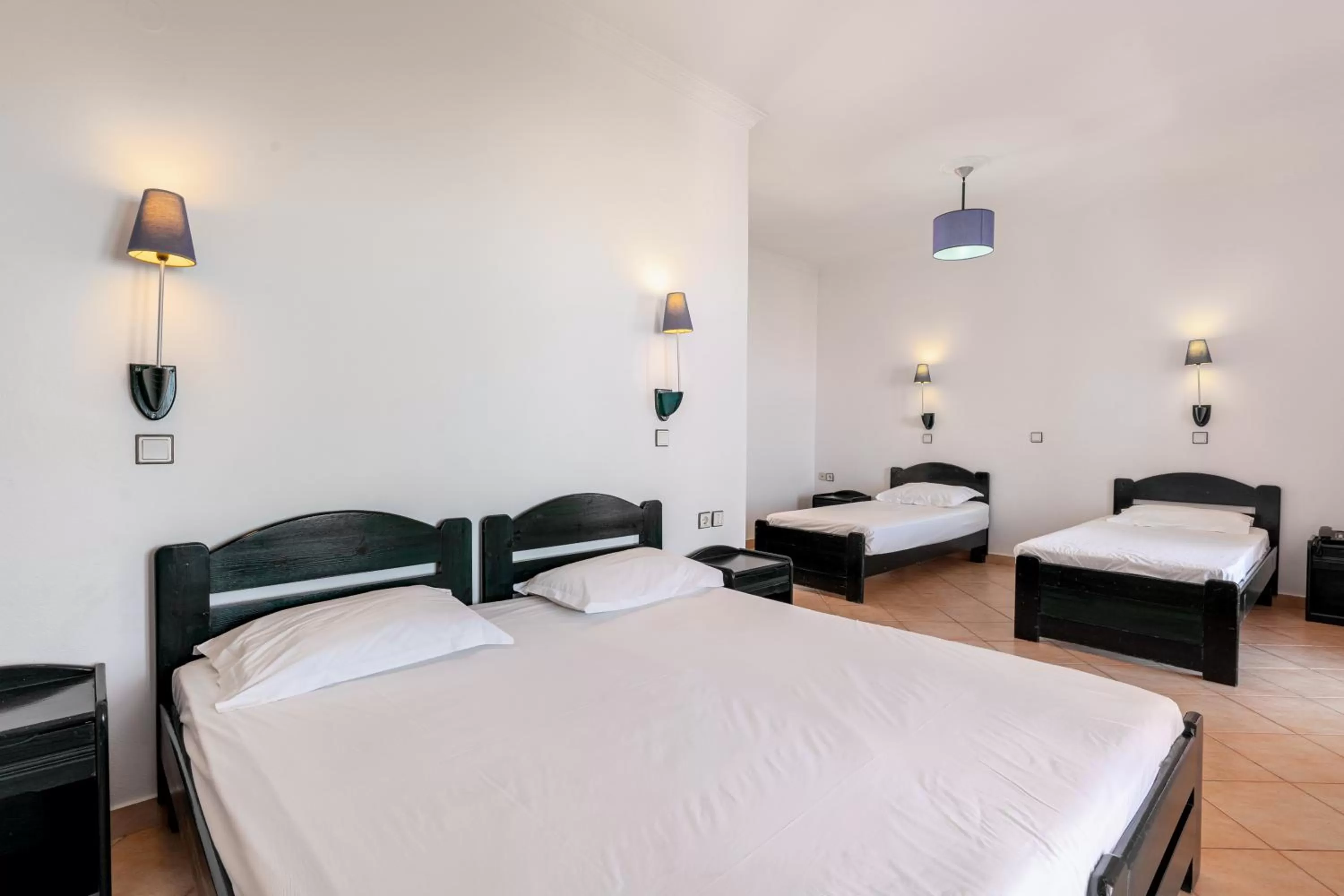 Bed in Pink Palace Beach Resort