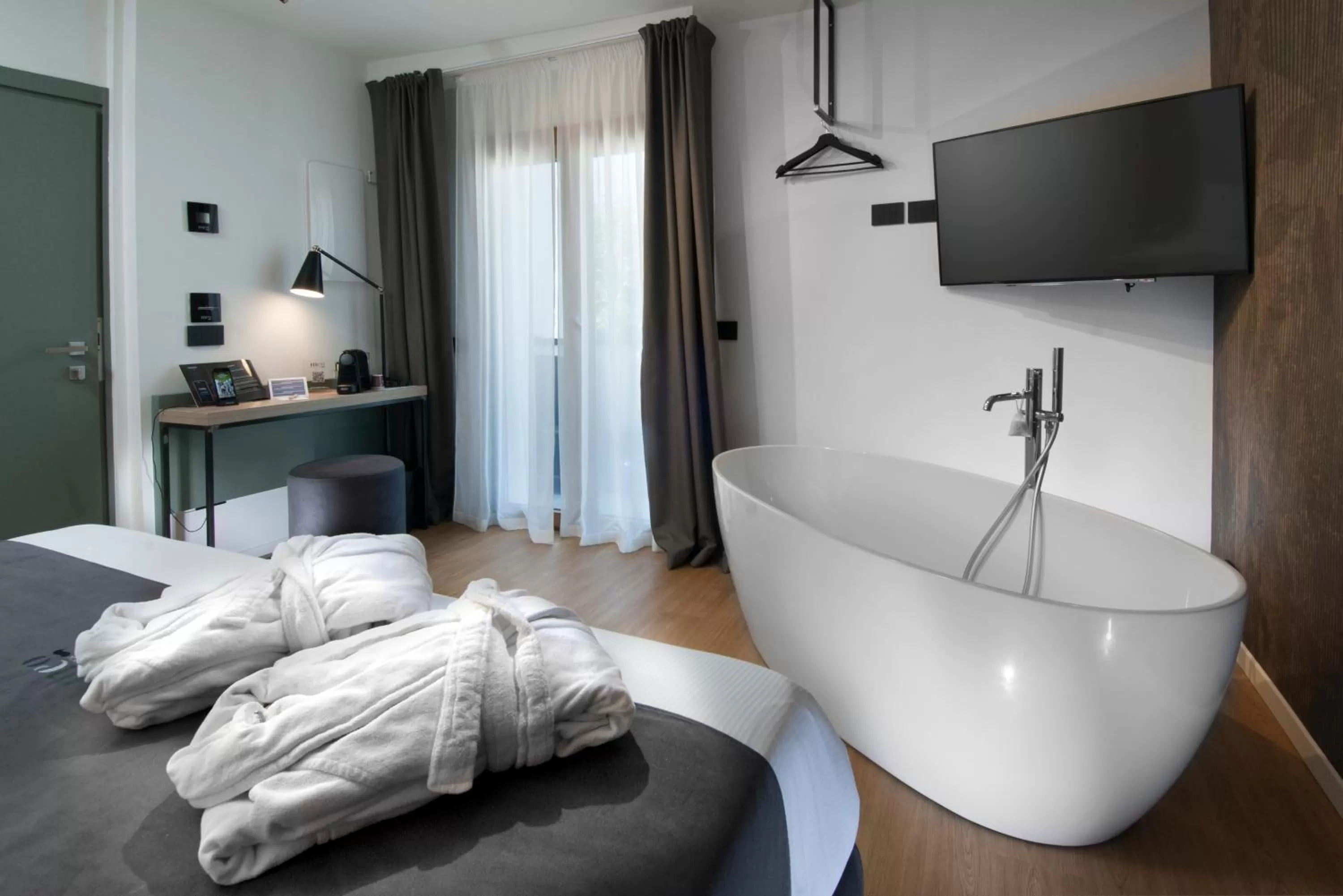 Bed in Meg Lifestyle Hotel & Apartaments