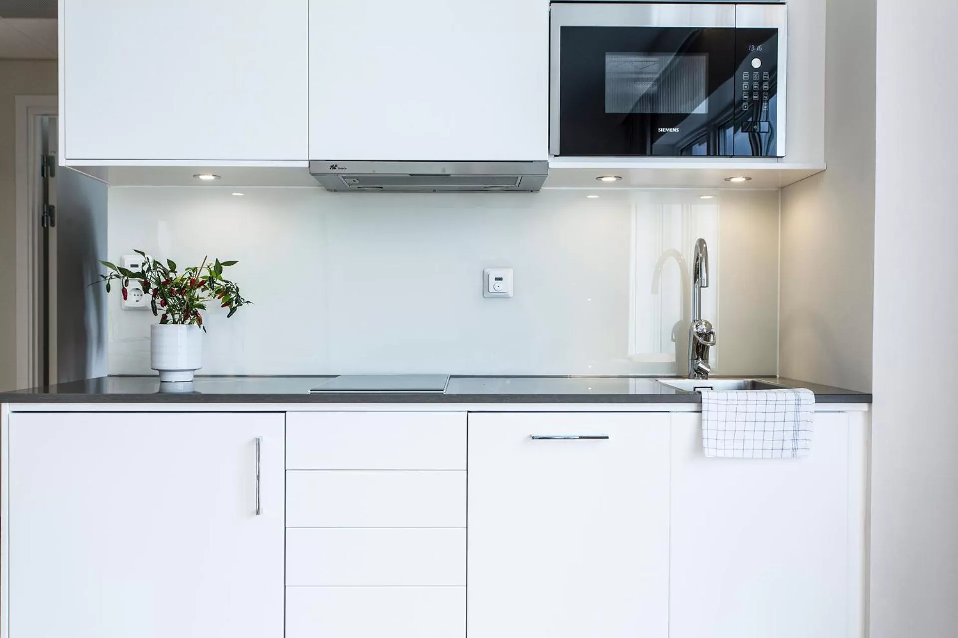Kitchen or kitchenette in Biz Apartment Hammarby Sjöstad