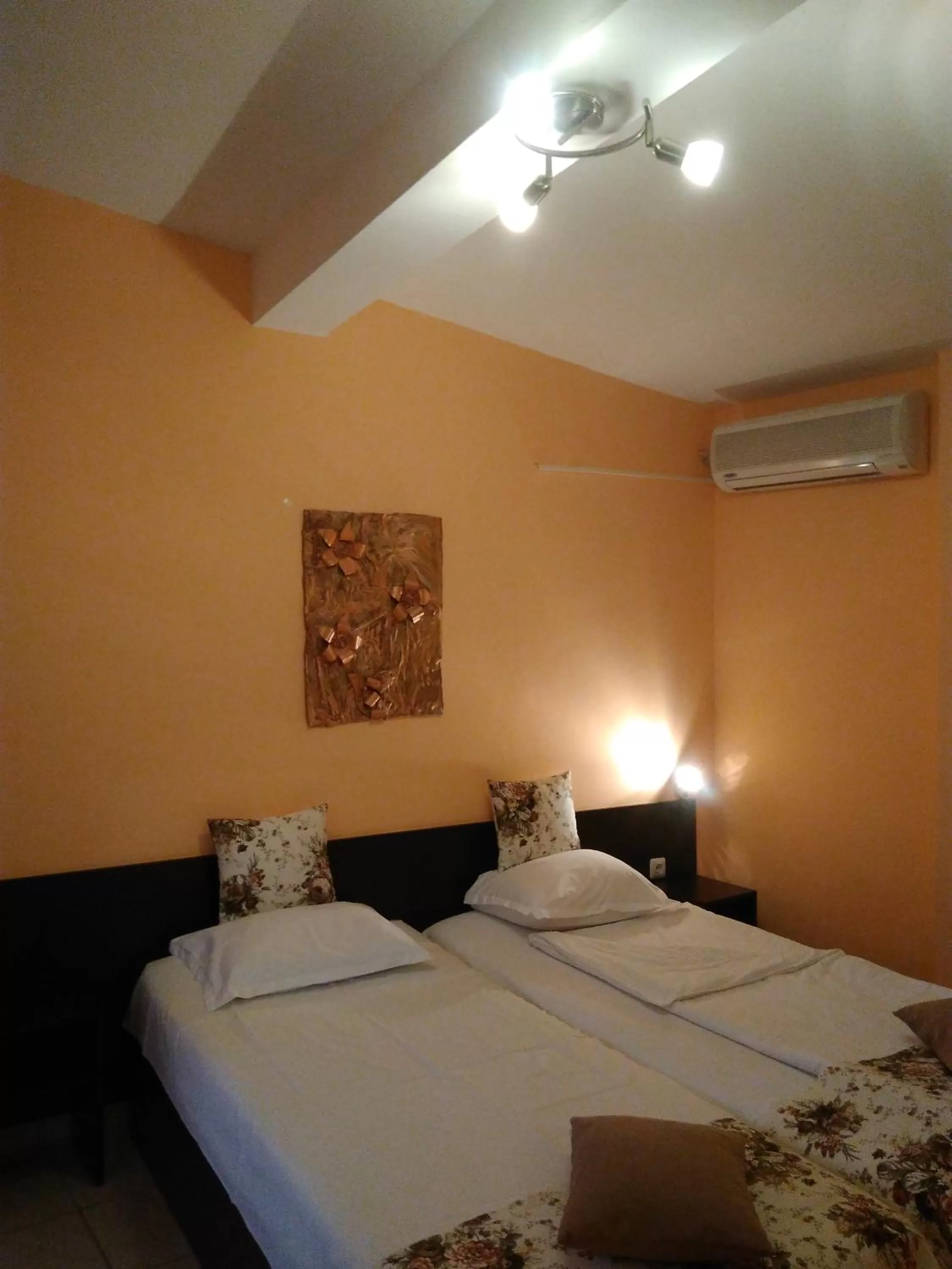 Bed in Hotel Poseidon