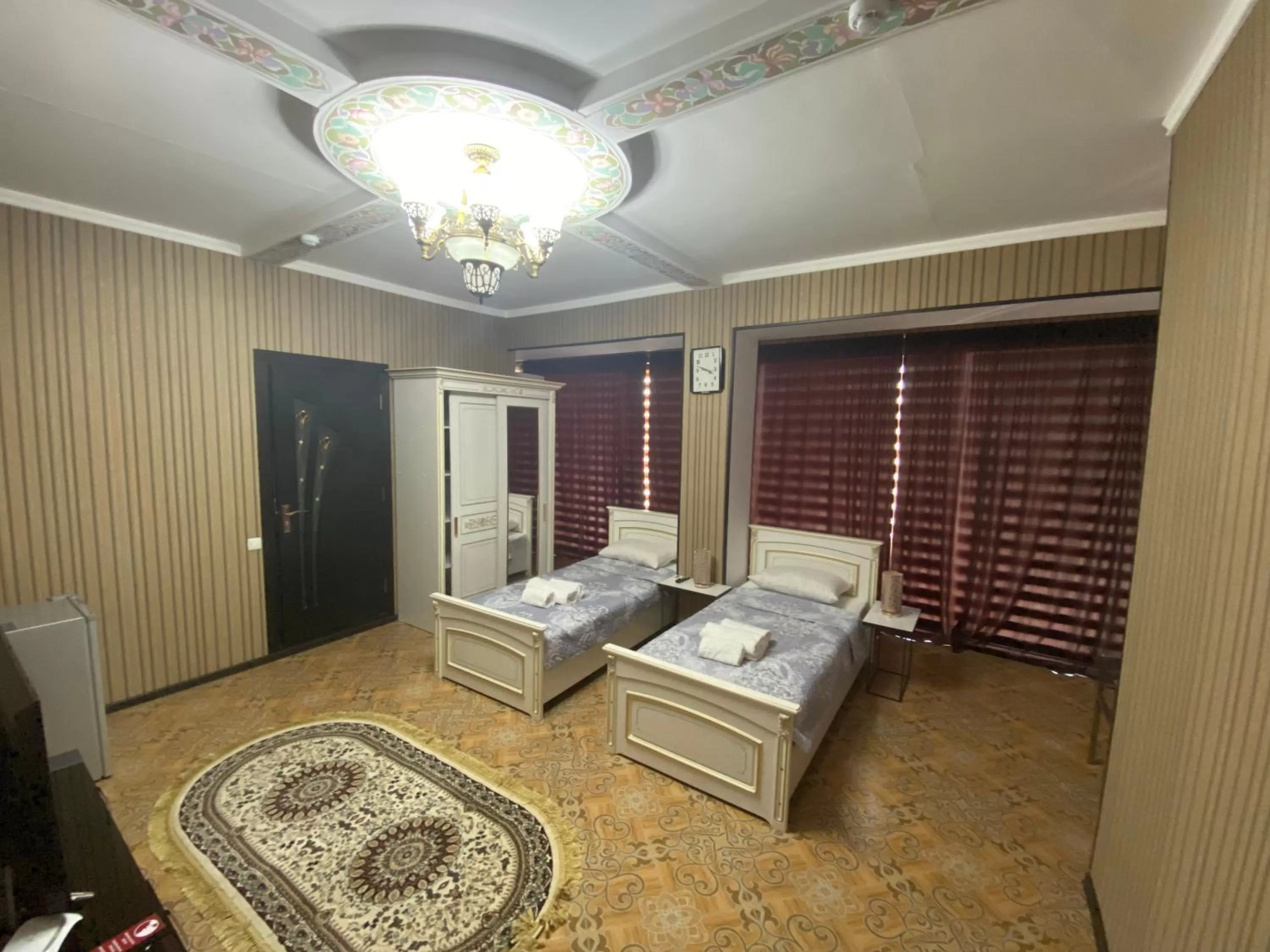 Bed in HOTEL UZBEGIM