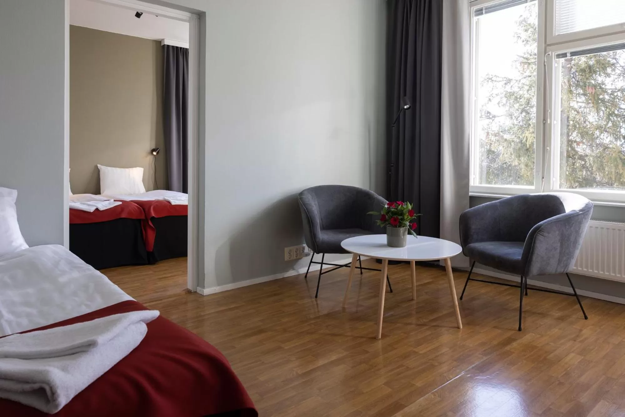 Living room, Bed in Strandnäs Hotell