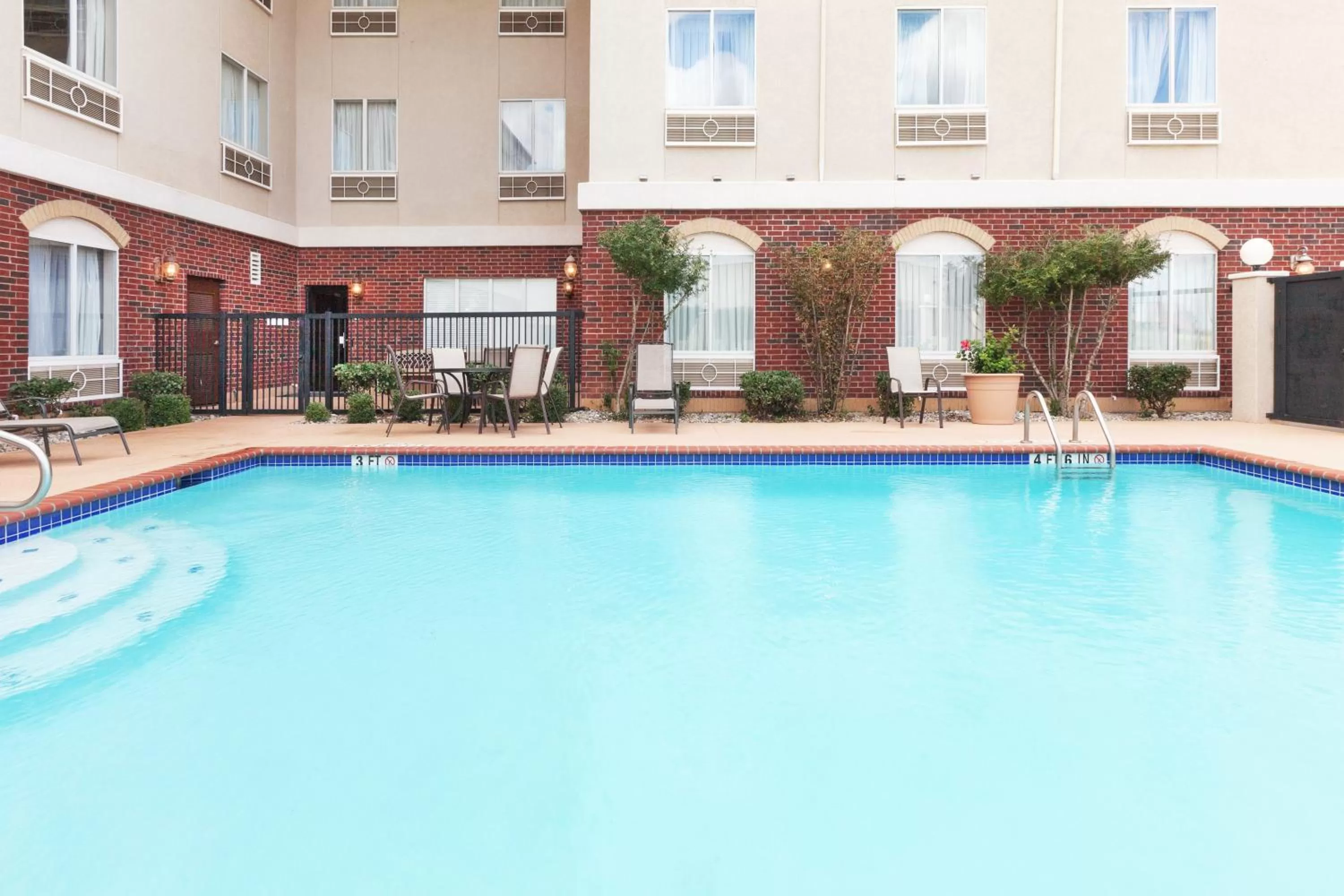 Swimming pool in Holiday Inn Express Hotel and Suites Abilene by IHG