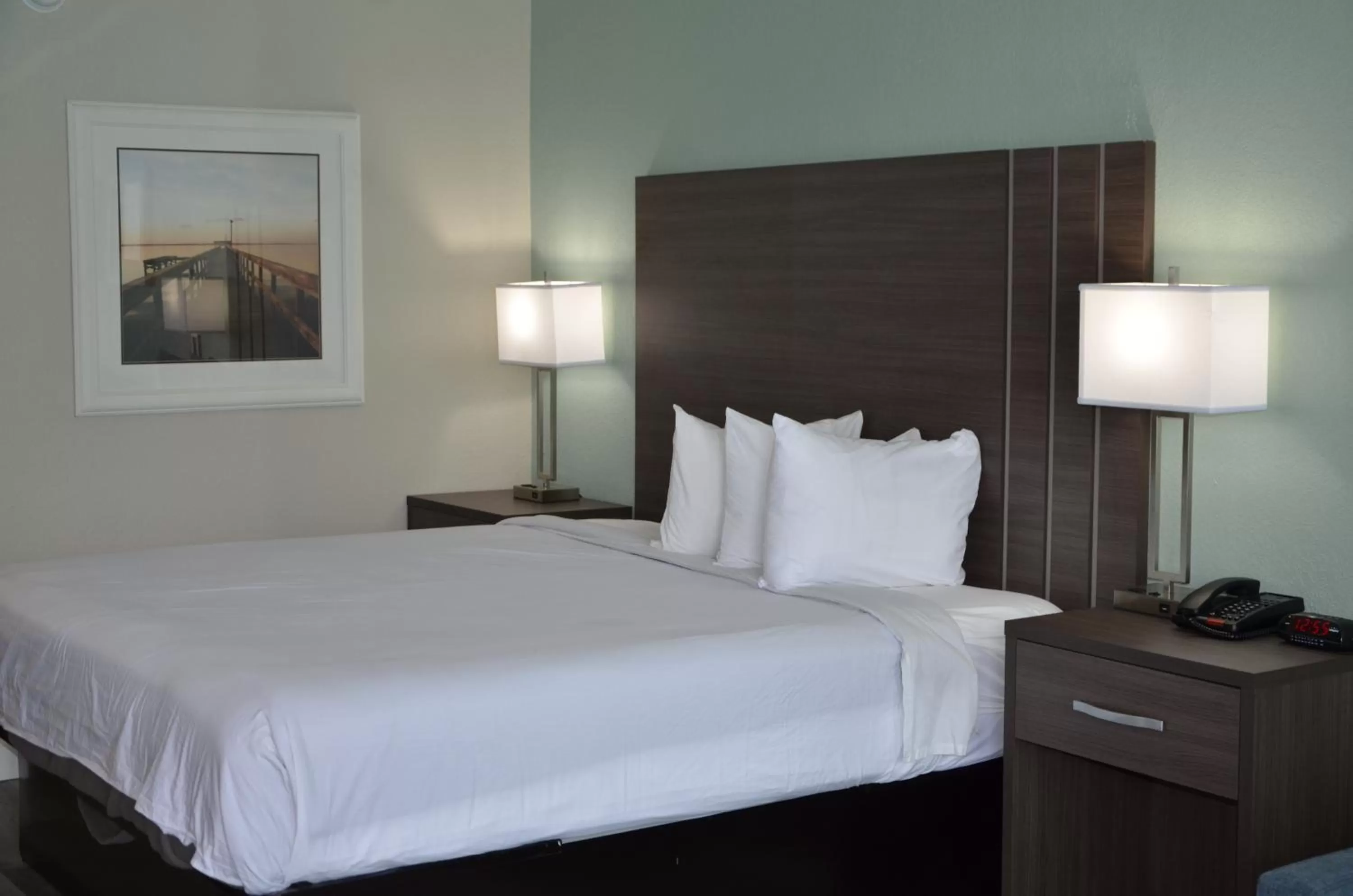 Bed in Opal Hotel & Suites