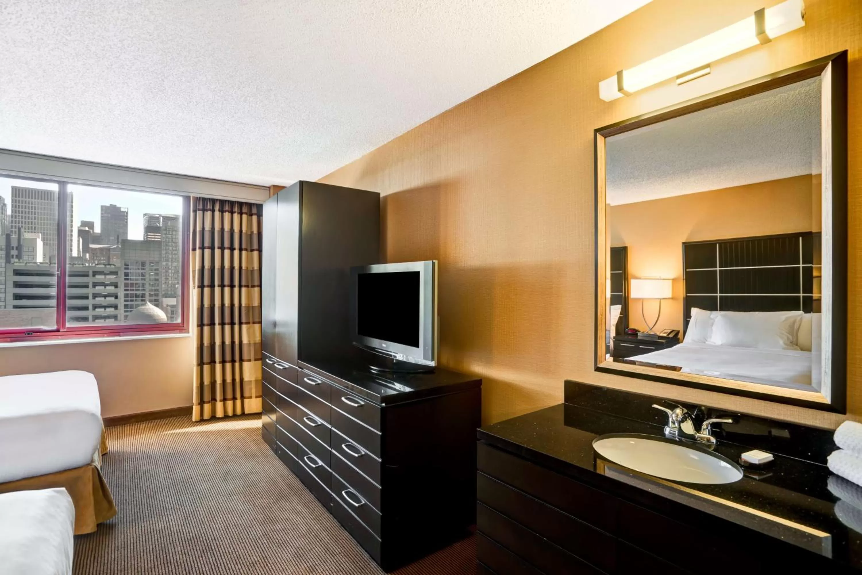 Two Room Corner Suite with Two Double Beds and Sofa bed in Embassy Suites Chicago - Downtown River North