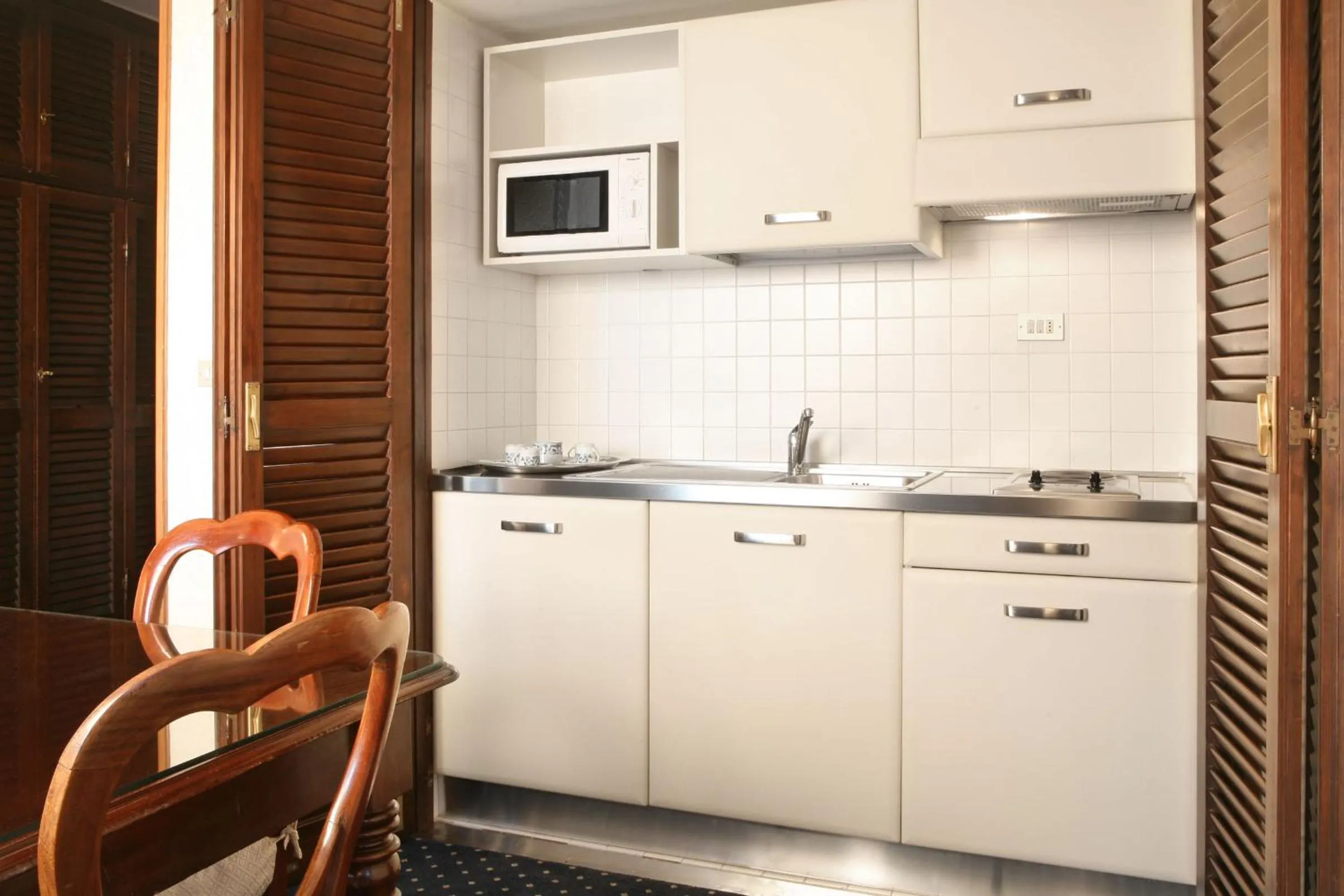 Kitchen or kitchenette in Aldrovandi Residence City Suites